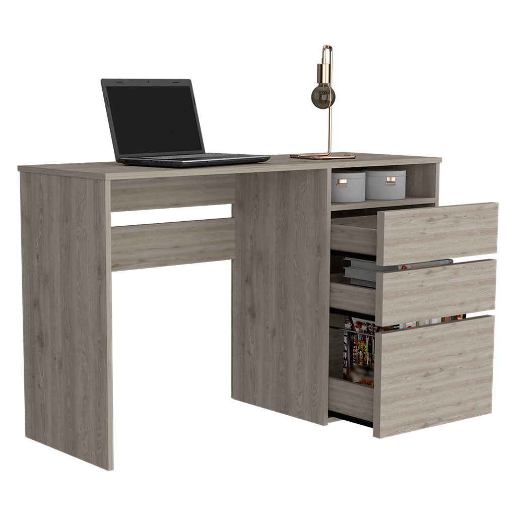 Modern grey wood desk with open shelf and three drawers holding books
