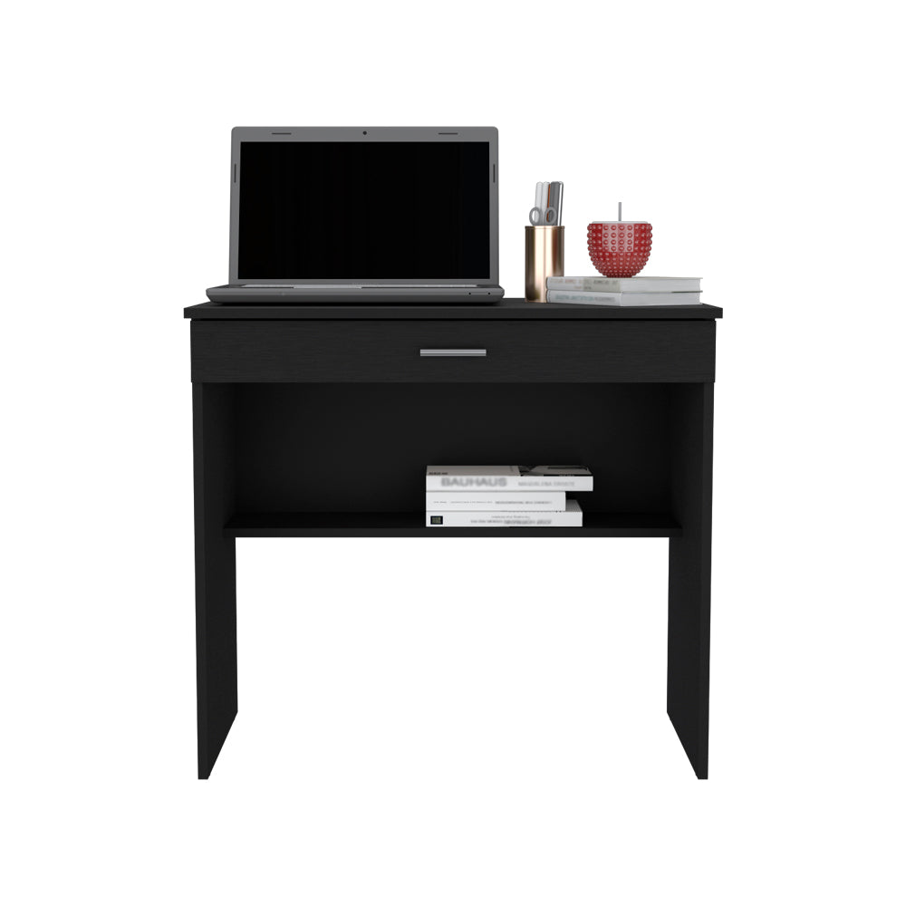 Black modern desk with laptop and decorative items