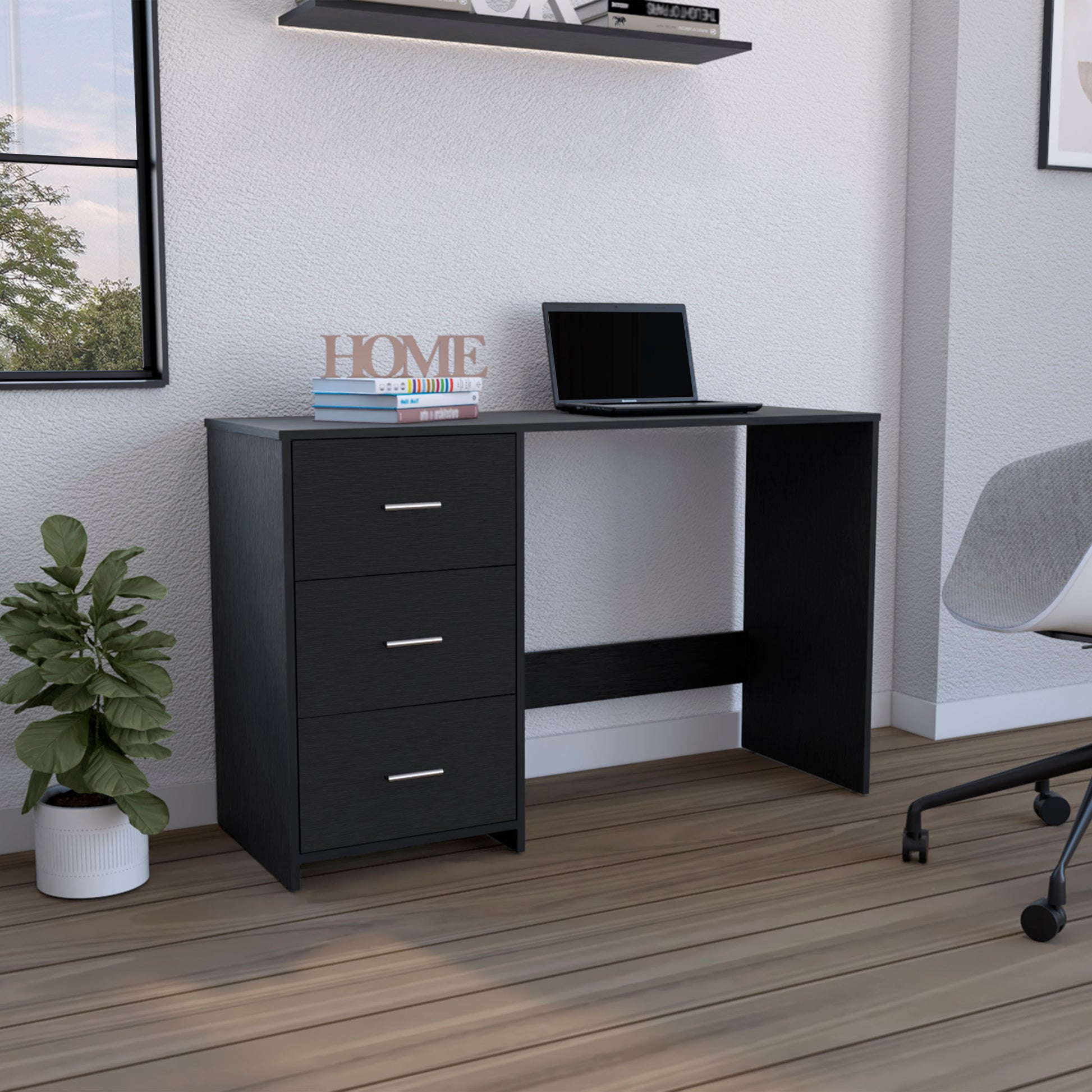 Black modern desk with three drawers and a laptop for home office use