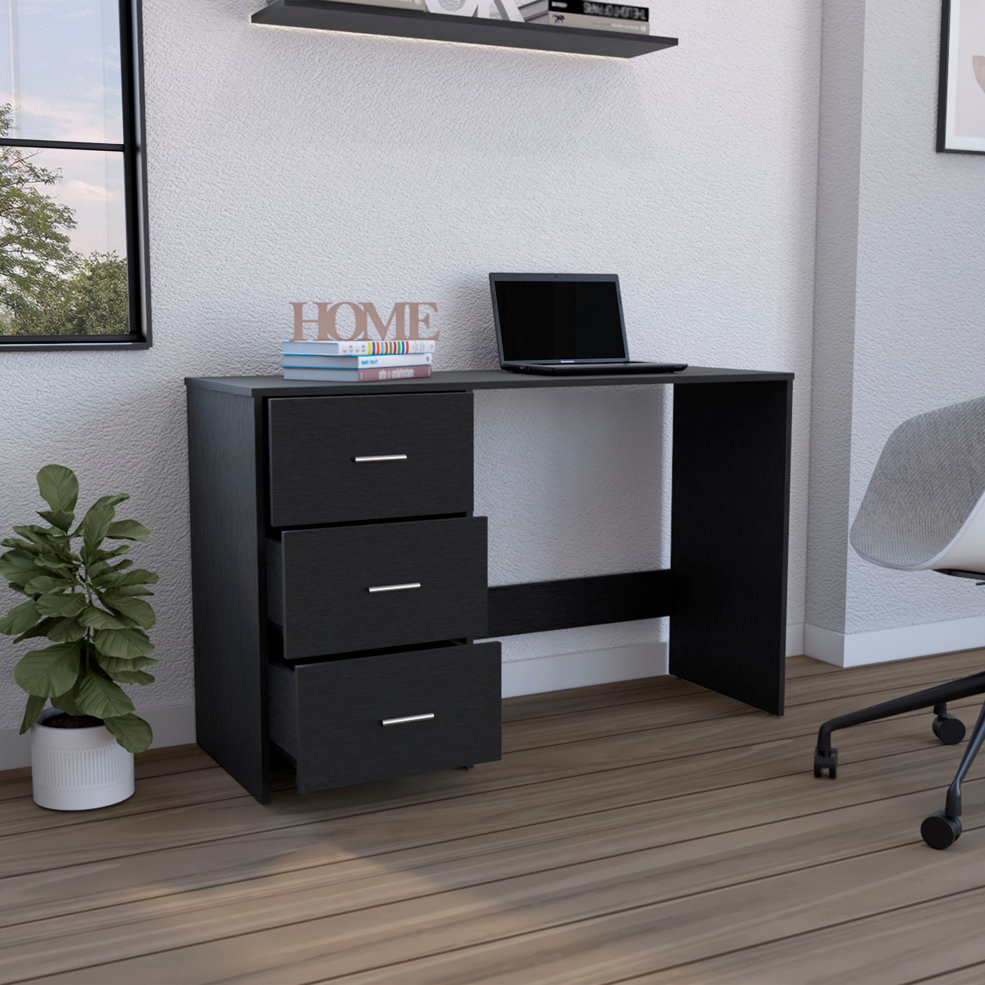 Black modern desk with three drawers and silver hardware ideal for a home office