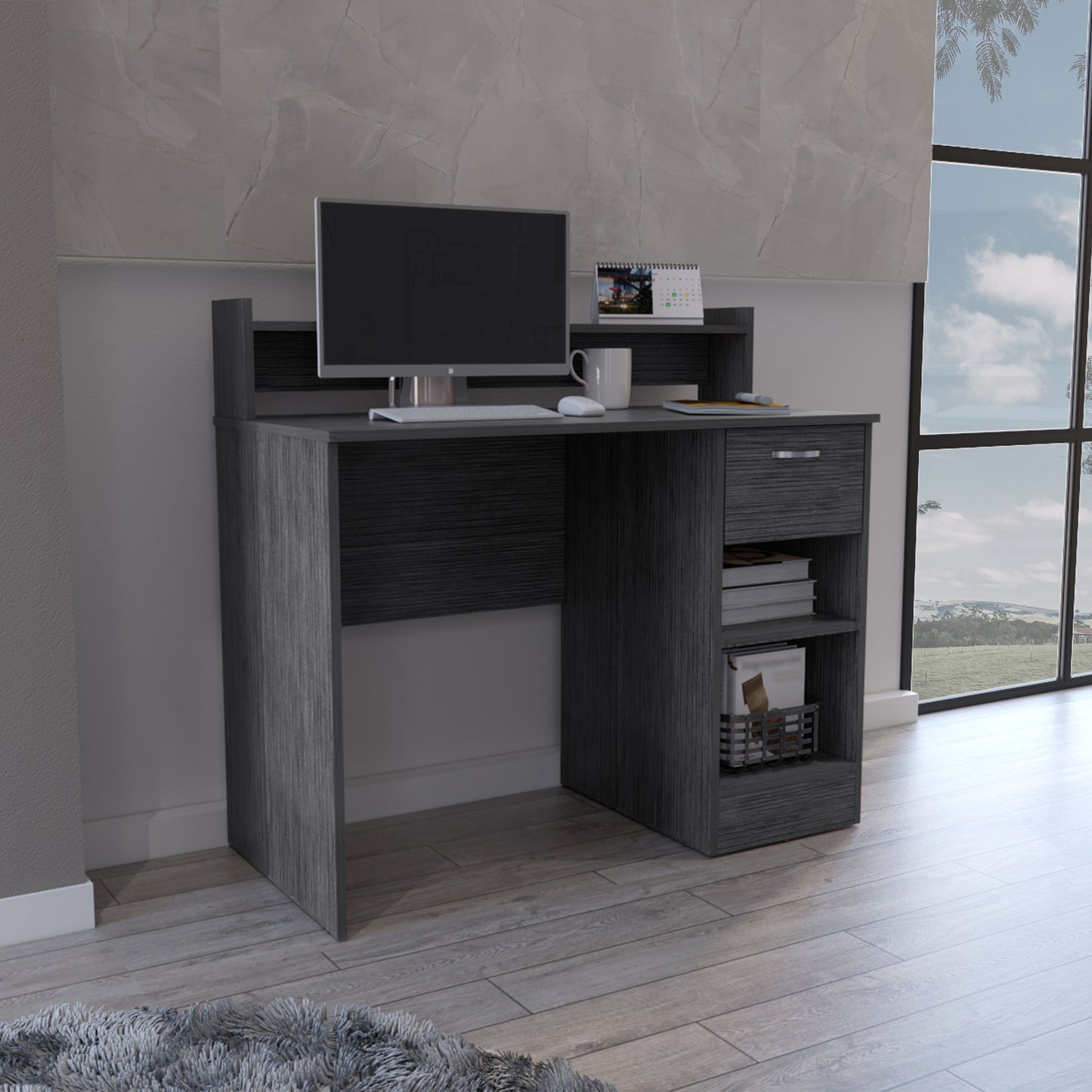 Dark grey wood grain compact desk with keyboard mouse monitor and storage shelves