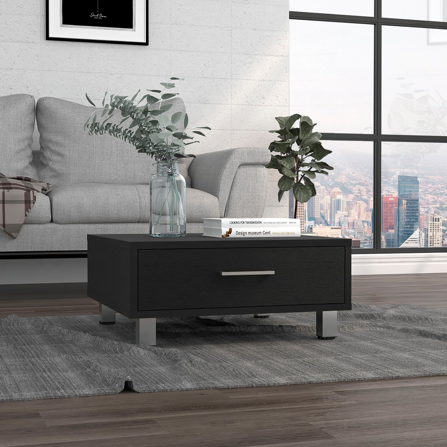 Modern black coffee table with one drawer and brushed metal legs