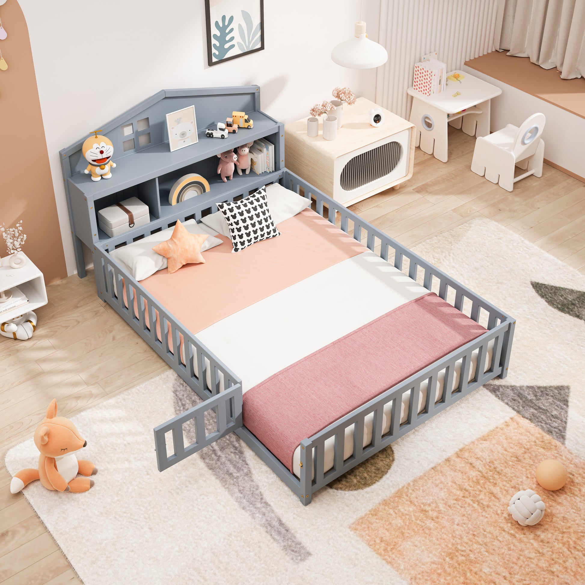 Gray wooden toddler bed with builtin bookshelf and pink bedding perfect for nursery