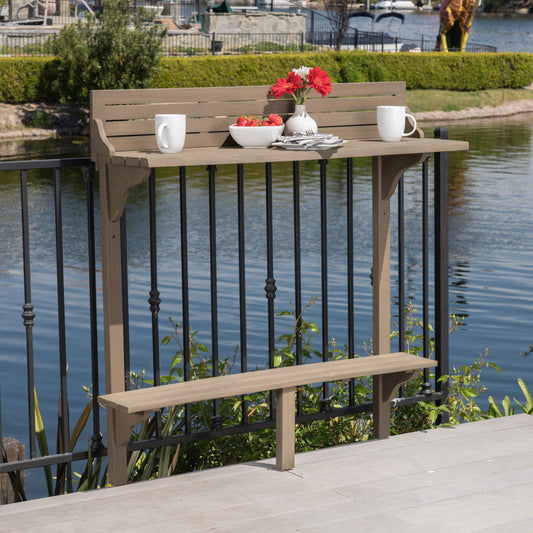 Brown acacia wood balcony bar with attached bench ideal for outdoor dining