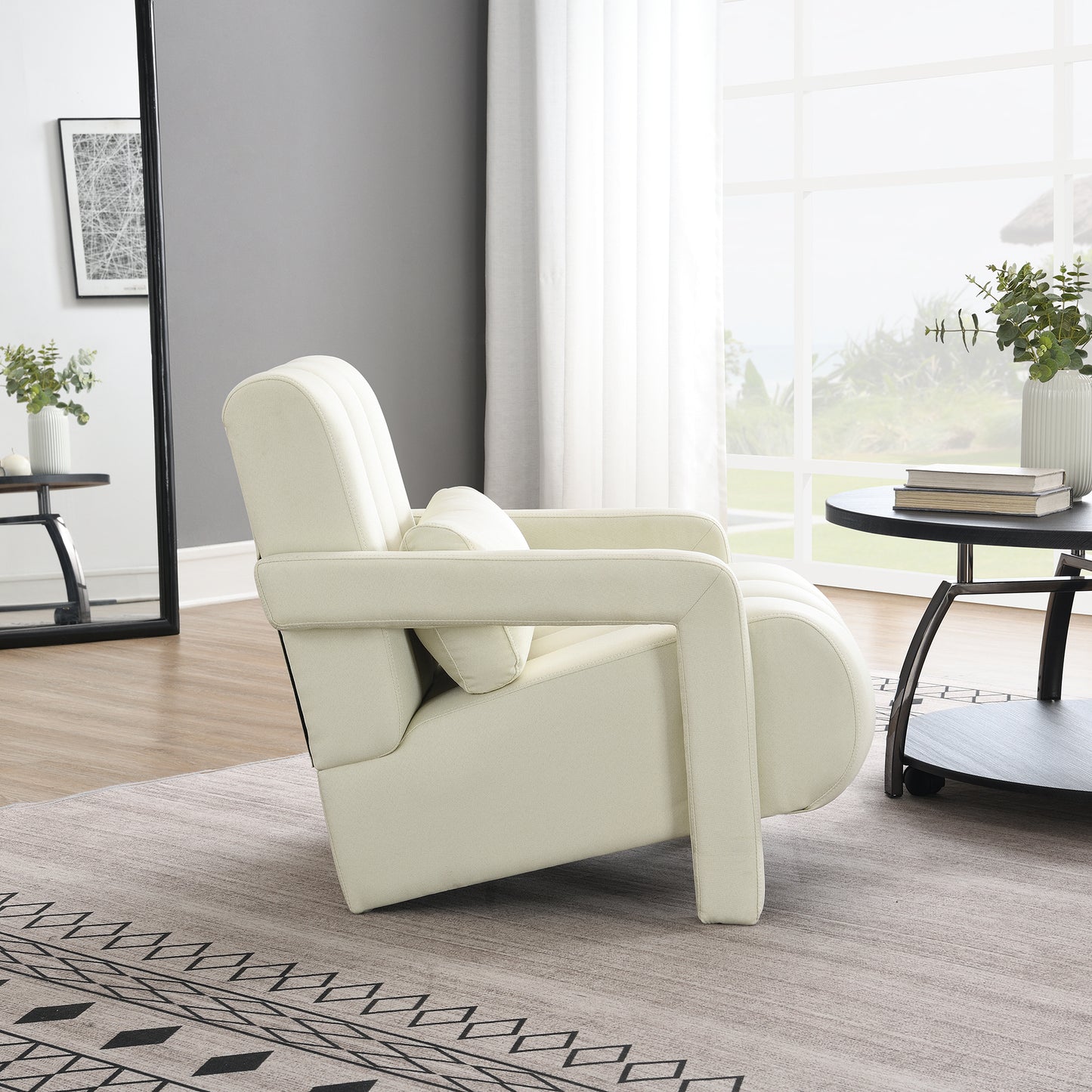 Cream upholstered armchair with channel tufting plush pillow and modern design