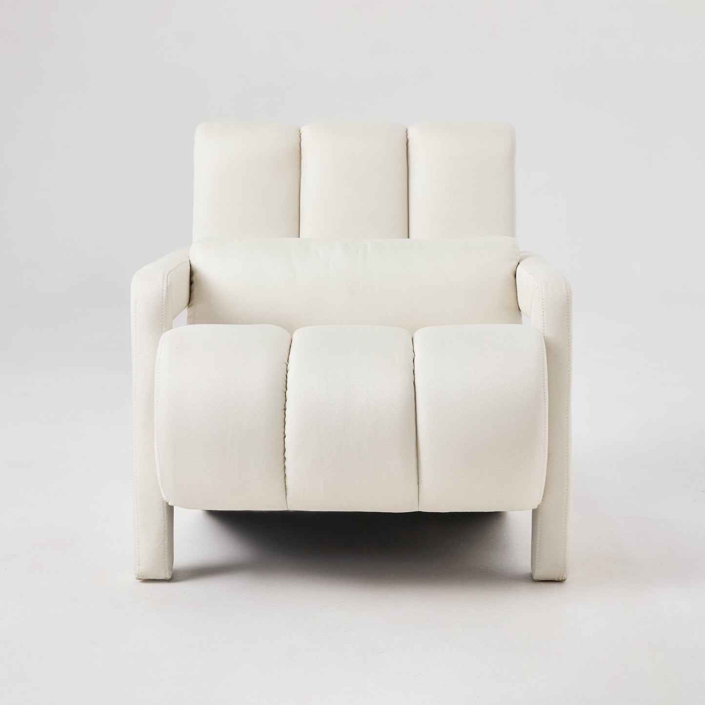 Cream fabric armchair with deep button tufting on seat and back modern style