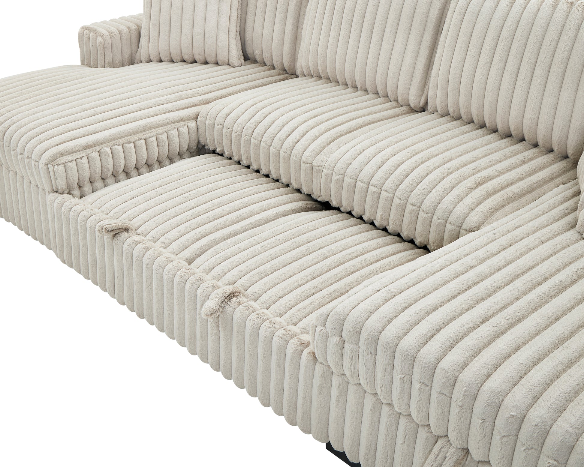Closeup of a plush beige corduroy sectional sofas armrest and seat cushions