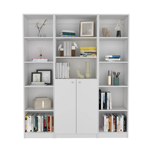 Modern white bookshelf unit filled with various books decorative items and framed art