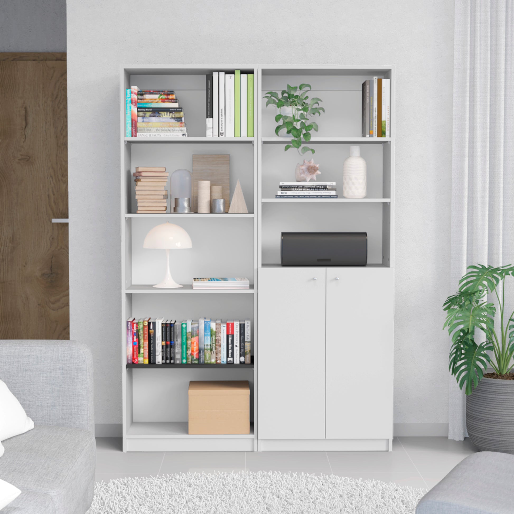 White modular bookshelf with open shelves and storage cabinets