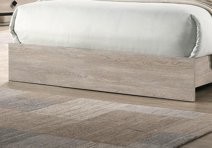 Platform bed frame with whitewashed wood finish and textured rug