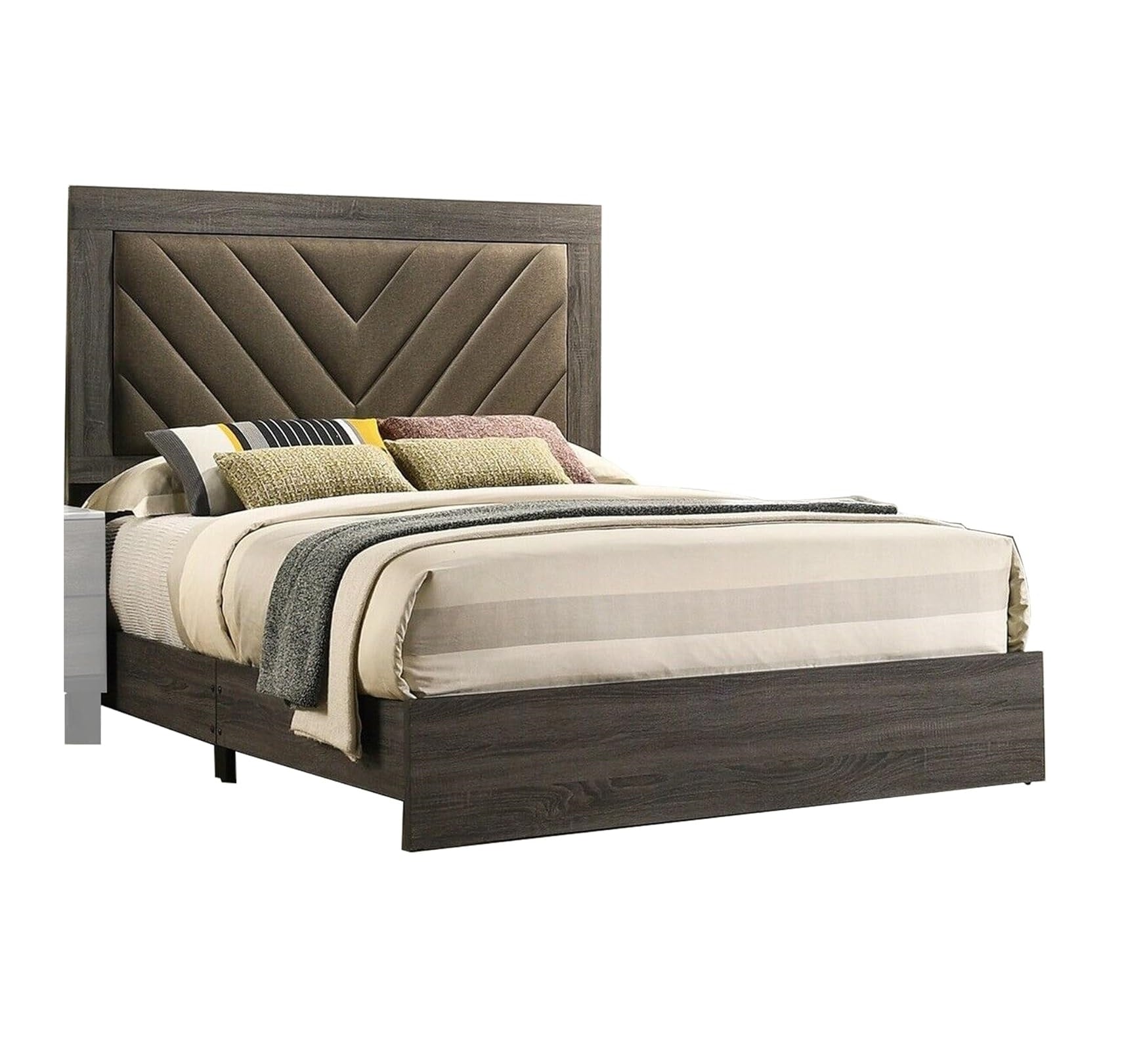 Dark wood platform bed with chevron upholstered headboard and striped bedding