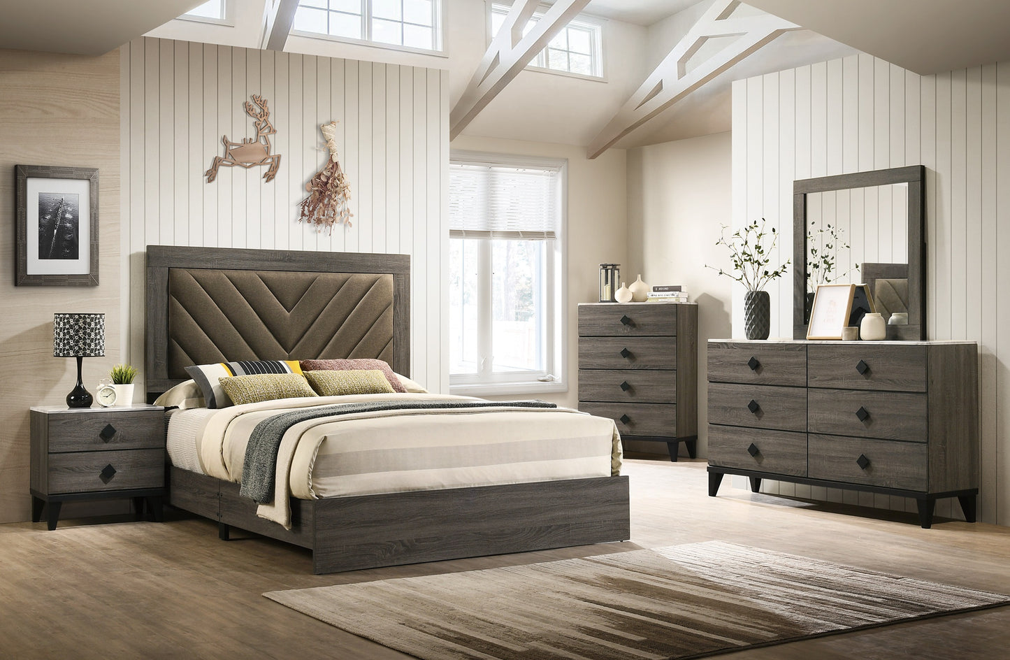 Gray wood kingsize bed with upholstered headboard and marbletop nightstand