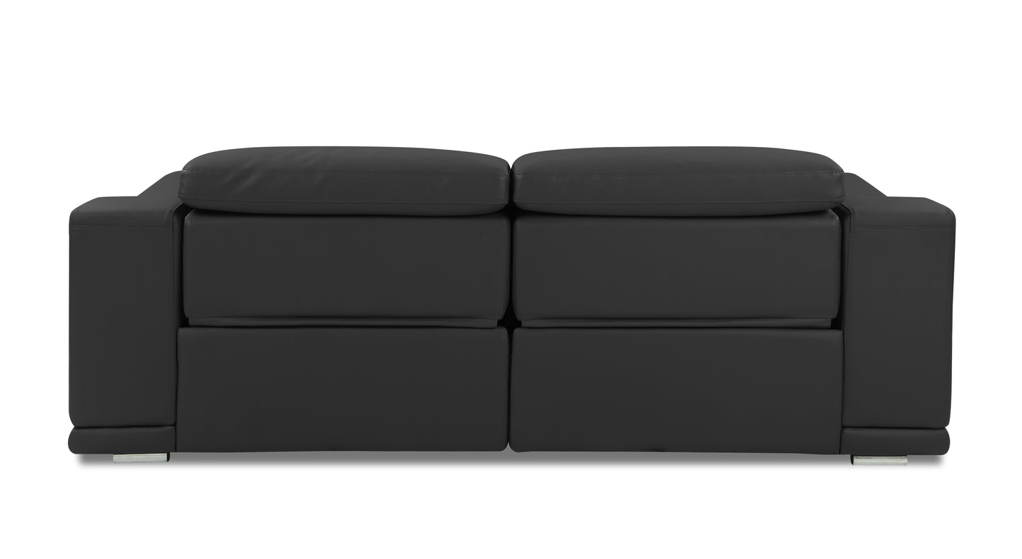 Black leather twoseater sofa with plush cushions and modern silver legs