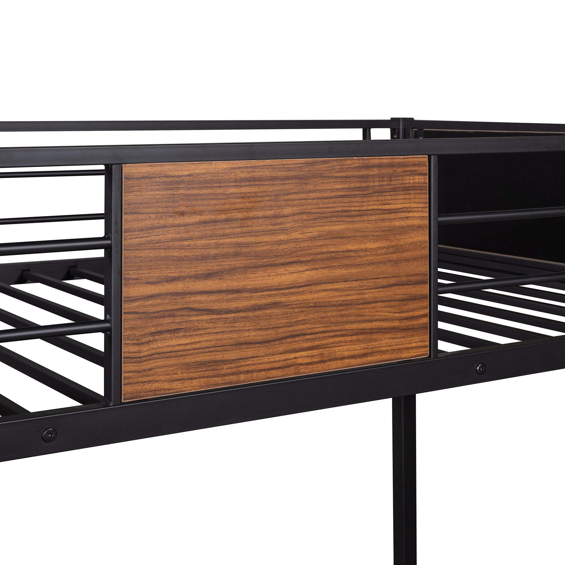 Closeup of a black metal bed frame with a woodeffect panel insert