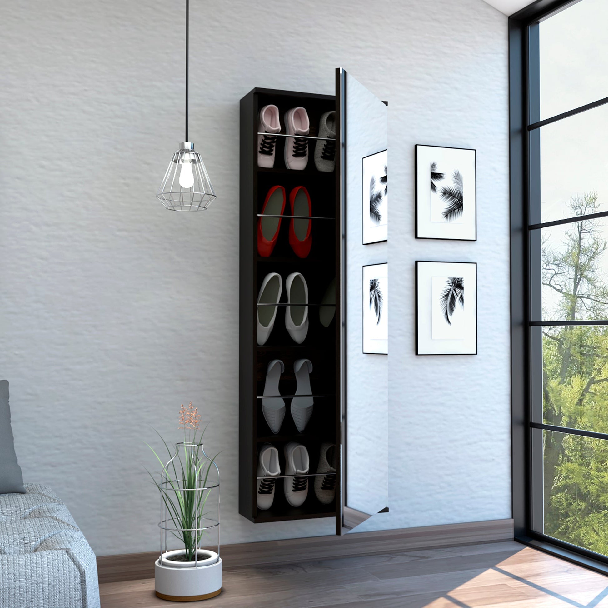 Slim black shoe cabinet with mirrored door storing various womens shoes