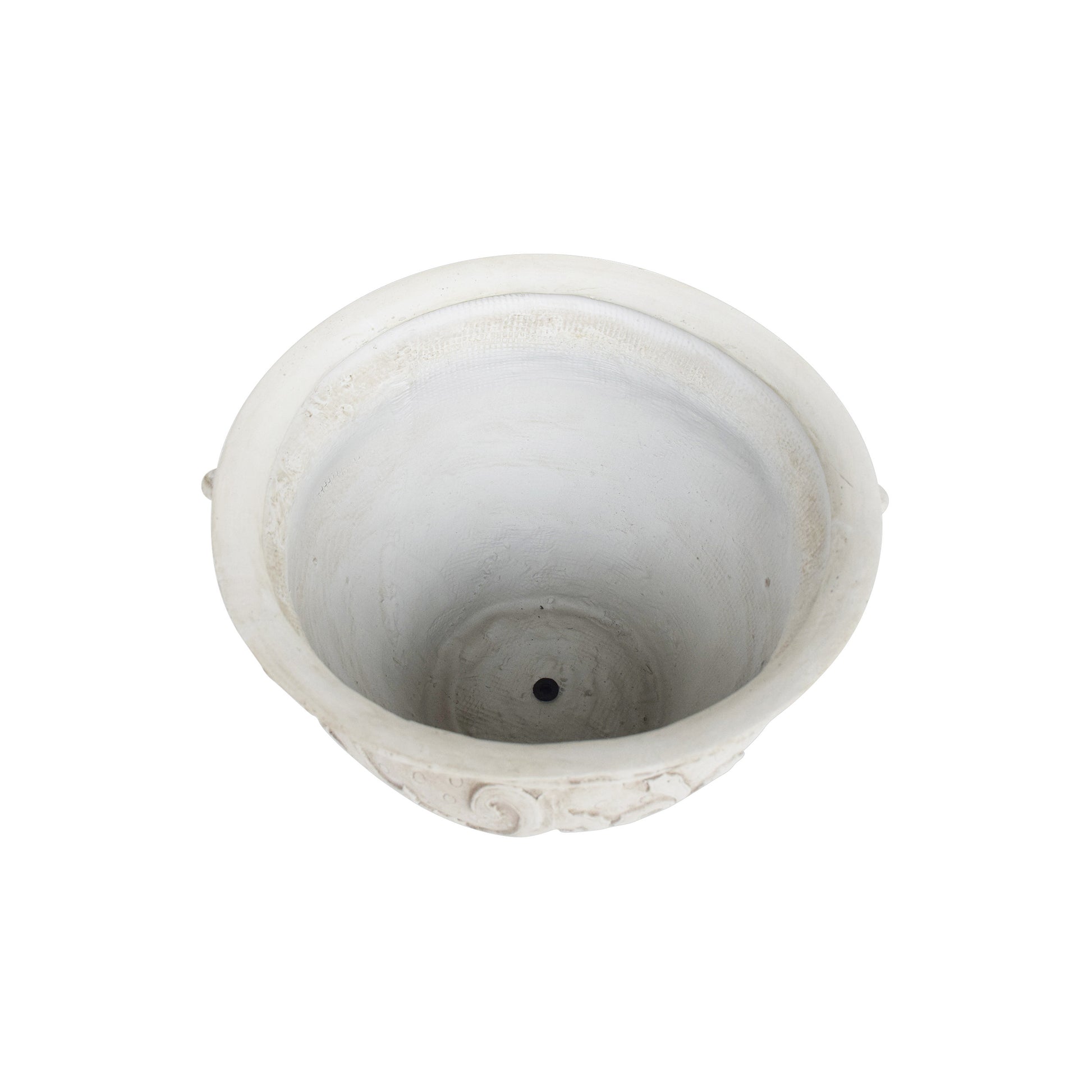 A white antiquestyle ceramic planter pot with embossed detailing and a drainage hole