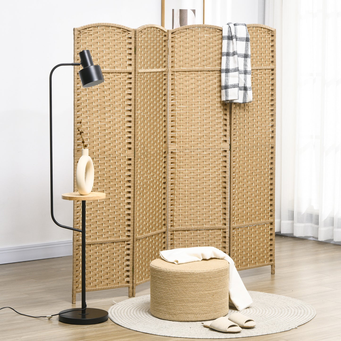 Tan wicker room divider with a woven texture providing privacy and decorative appeal