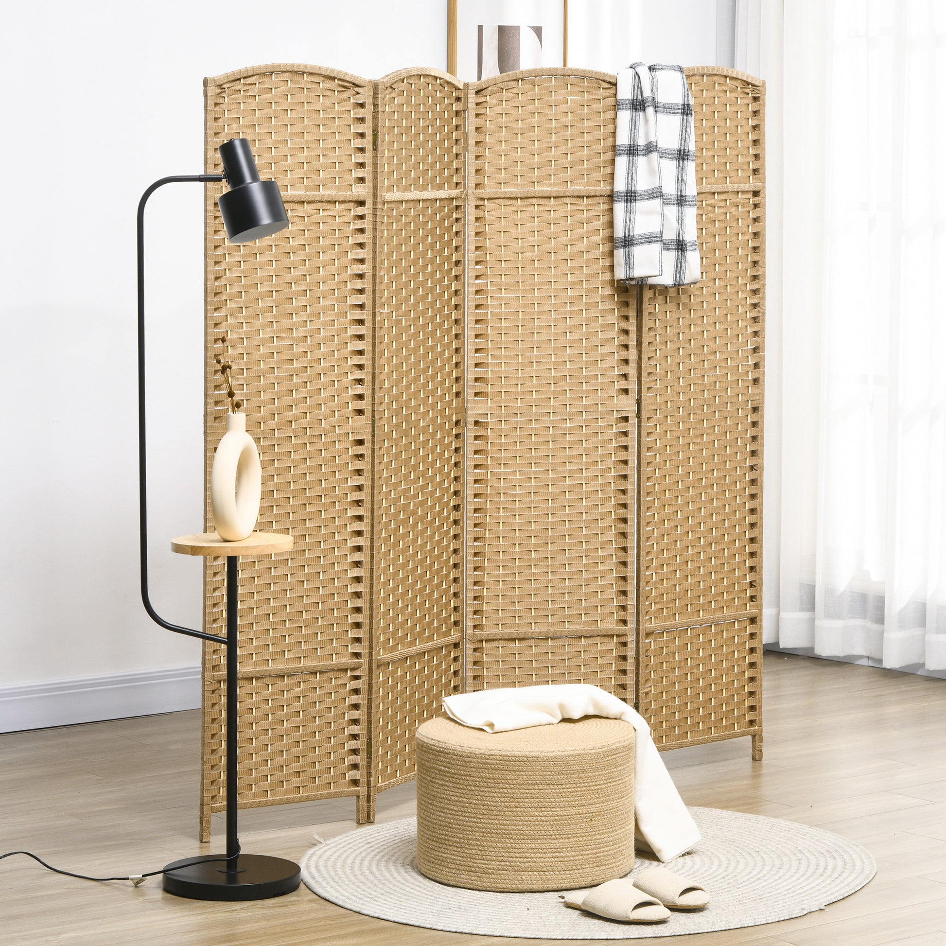 Tan wicker room divider with a woven texture providing privacy and decorative appeal