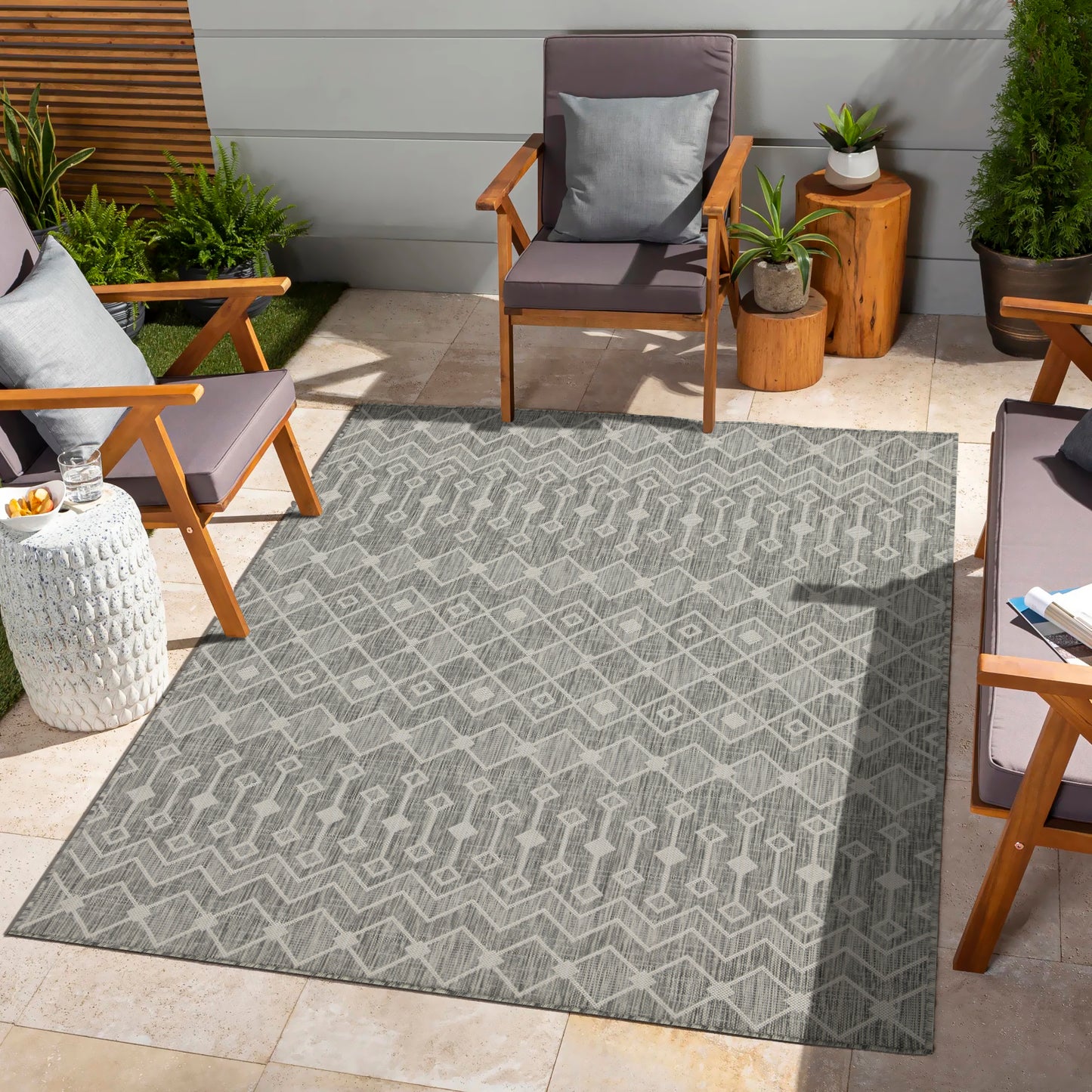 Grey geometric outdoor area rug with abstract diamond pattern
