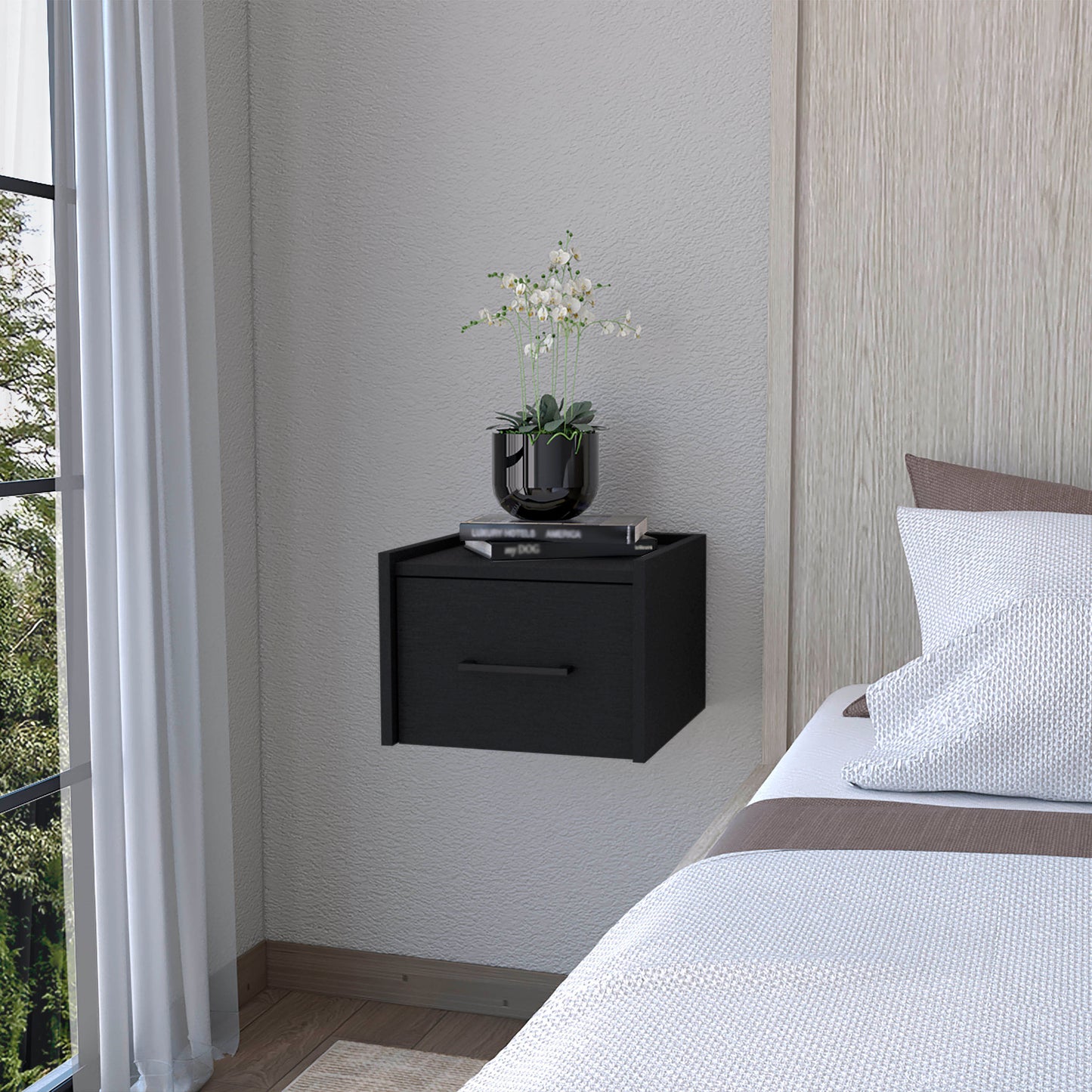Black floating nightstand with single drawer and metallic handle