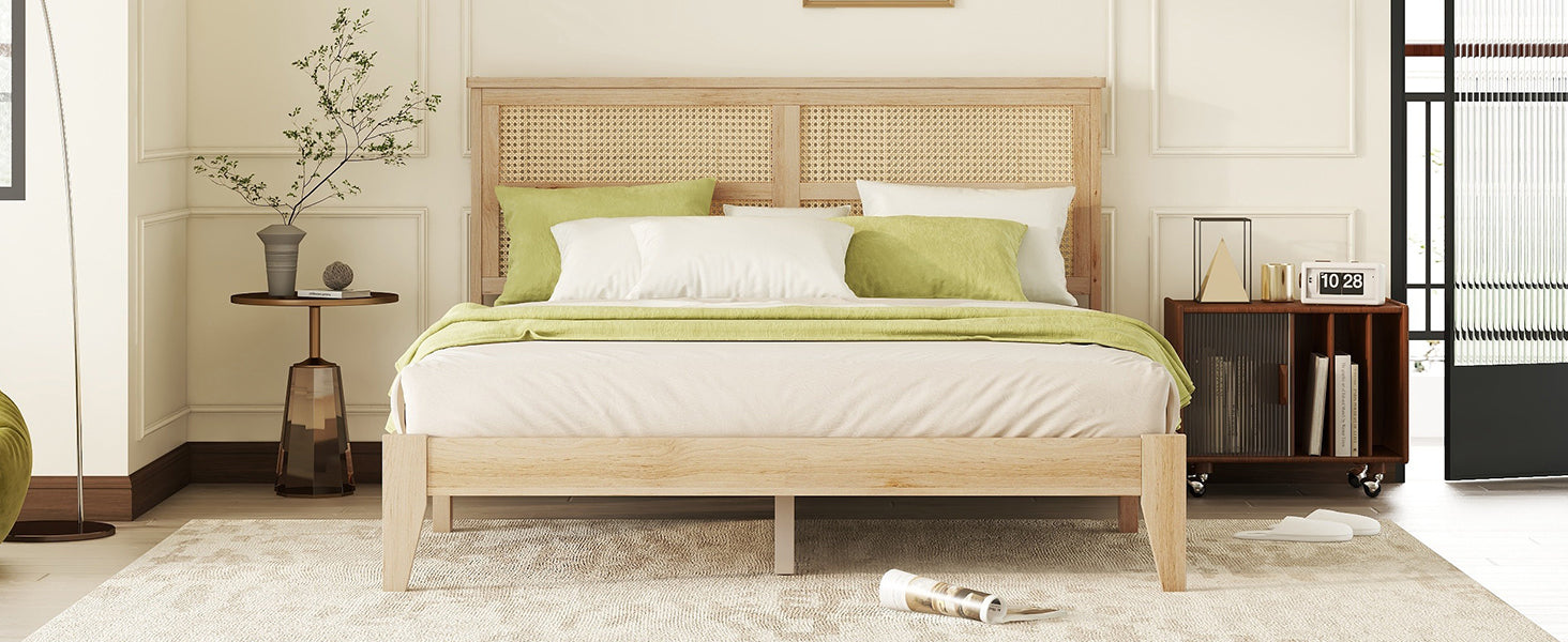 Light wood platform bed with woven rattan headboard and green accents