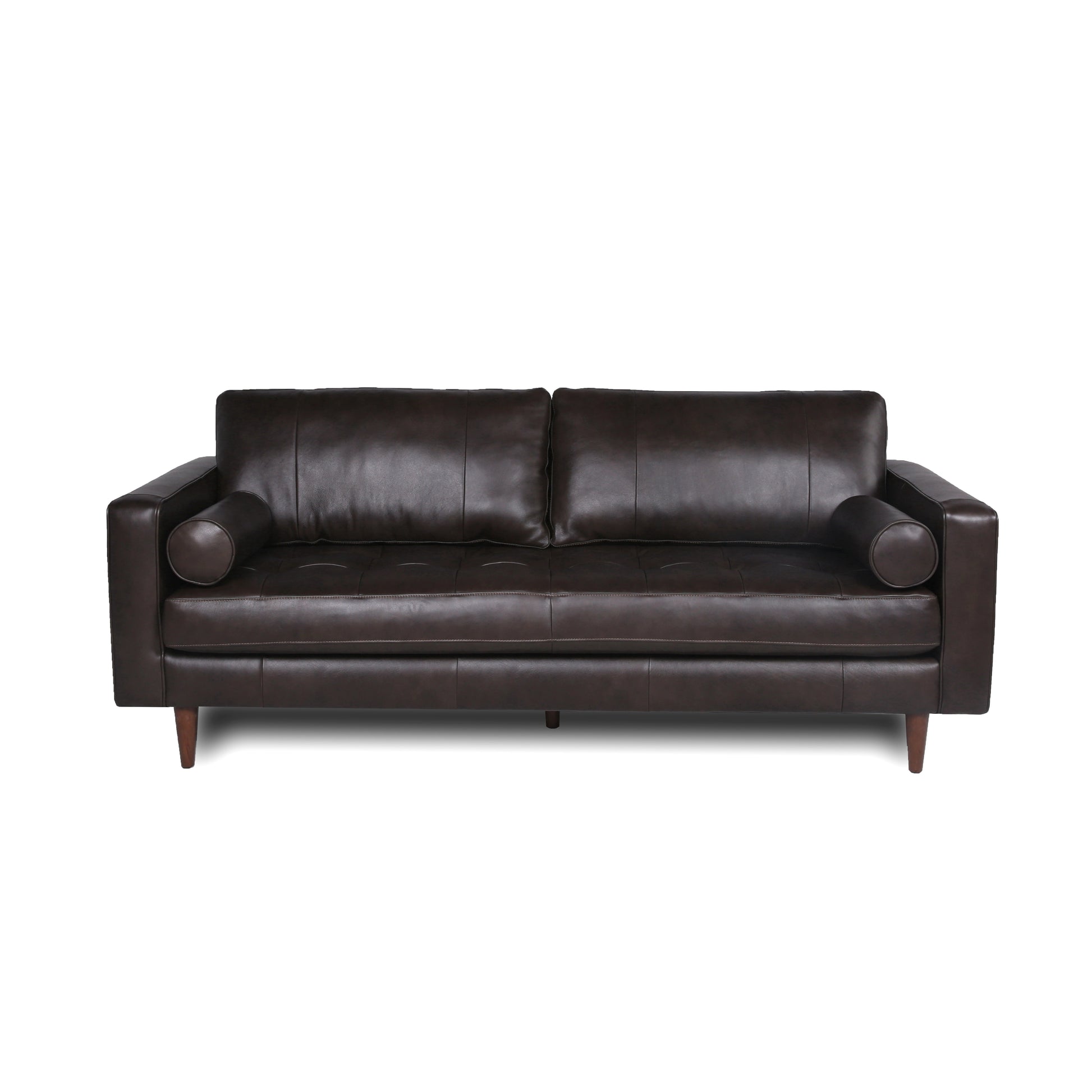 Dark brown tufted leather couch with bolster armrests and tapered wooden legs