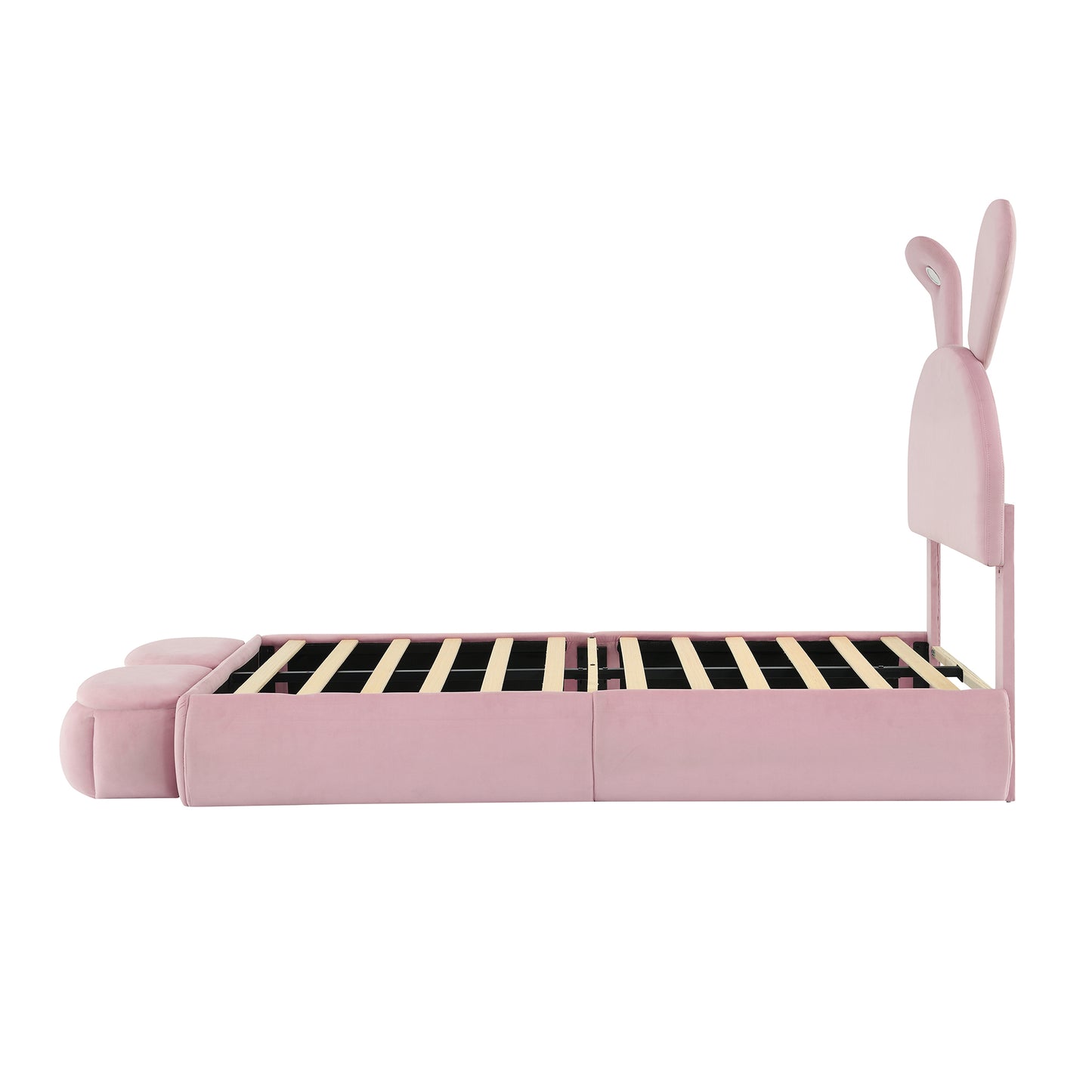Pink velvet twin bed with playful bunny ears headboard and rounded footboard