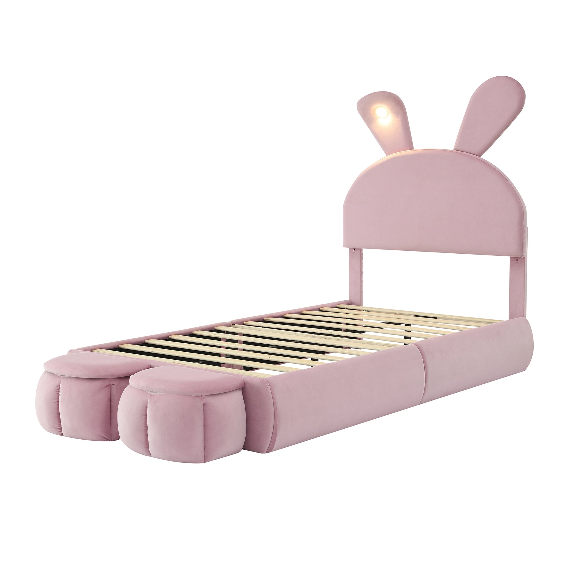 Pink velvet twin bed with bunny ears headboard and integrated lights