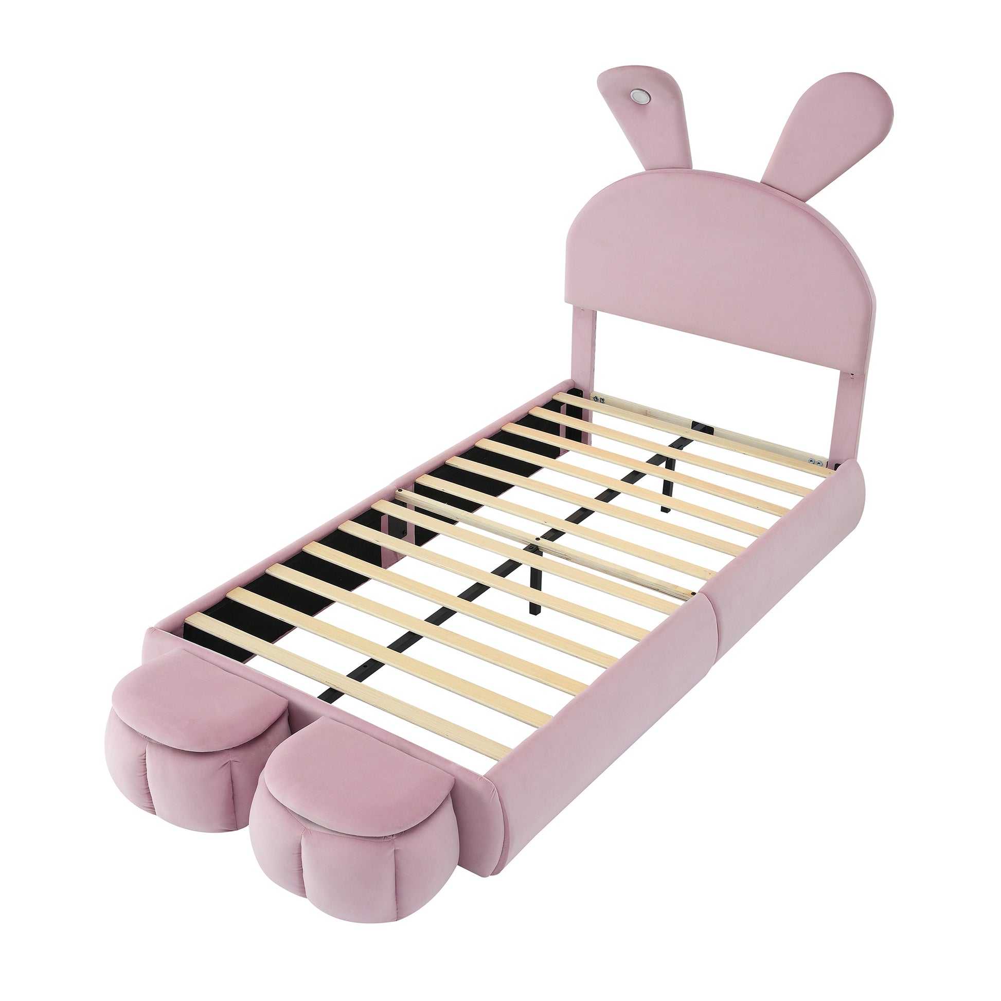 Pink velvet twin bed with bunny ears headboard and paw accents