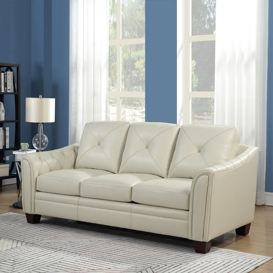 Cream tufted leather sofa with plush cushions and modern design for living rooms