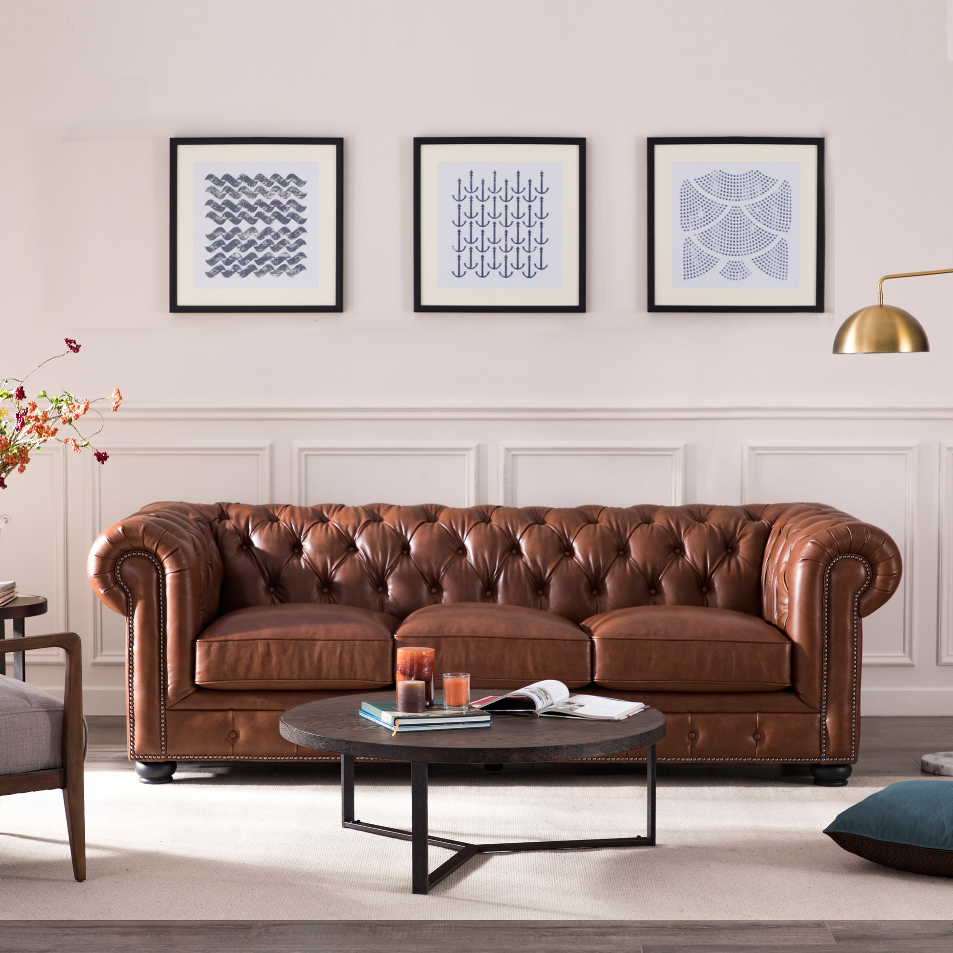 Luxurious brown leather chesterfield sofa with deep button tufting perfect for classic living rooms