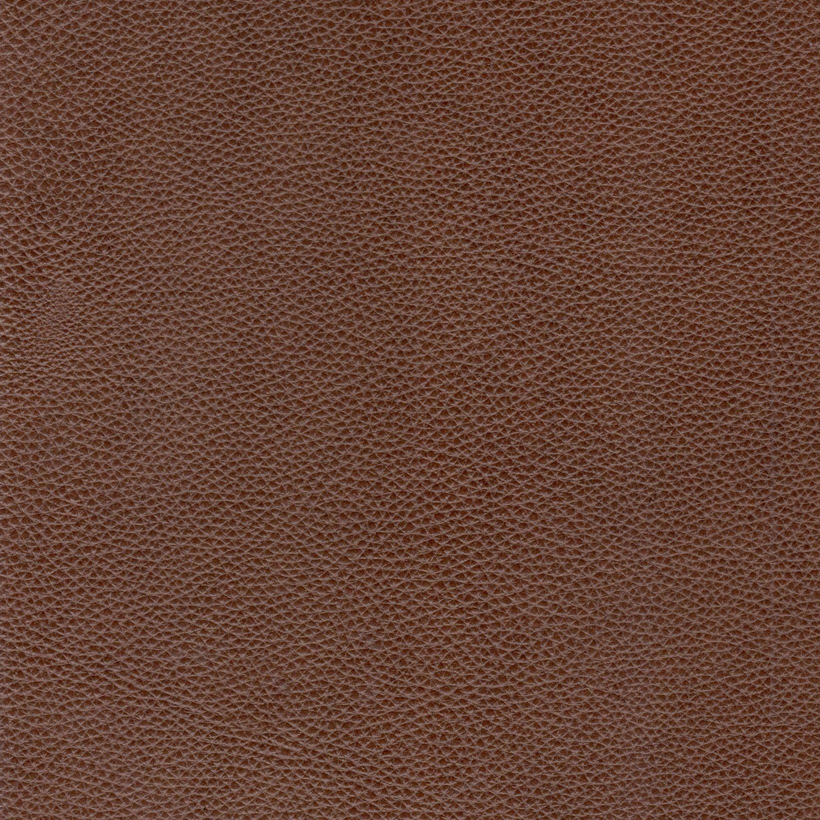 Rich brown textured leather material perfect for upholstery and accessories