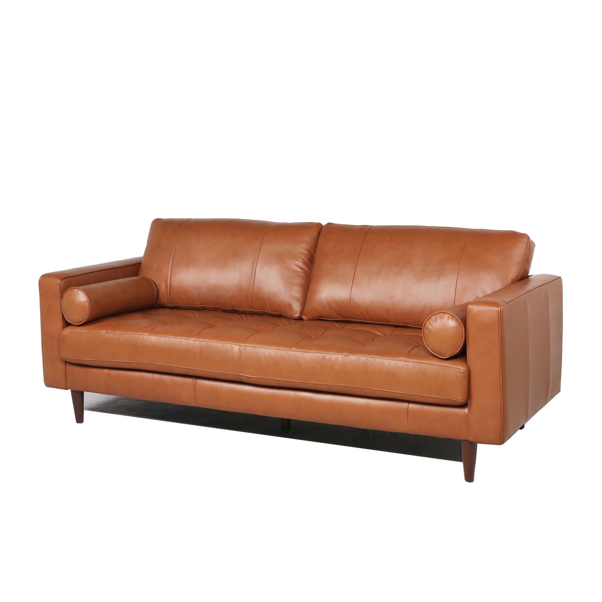 Modern tan leather seater sofa with tufted cushions and bolster pillows