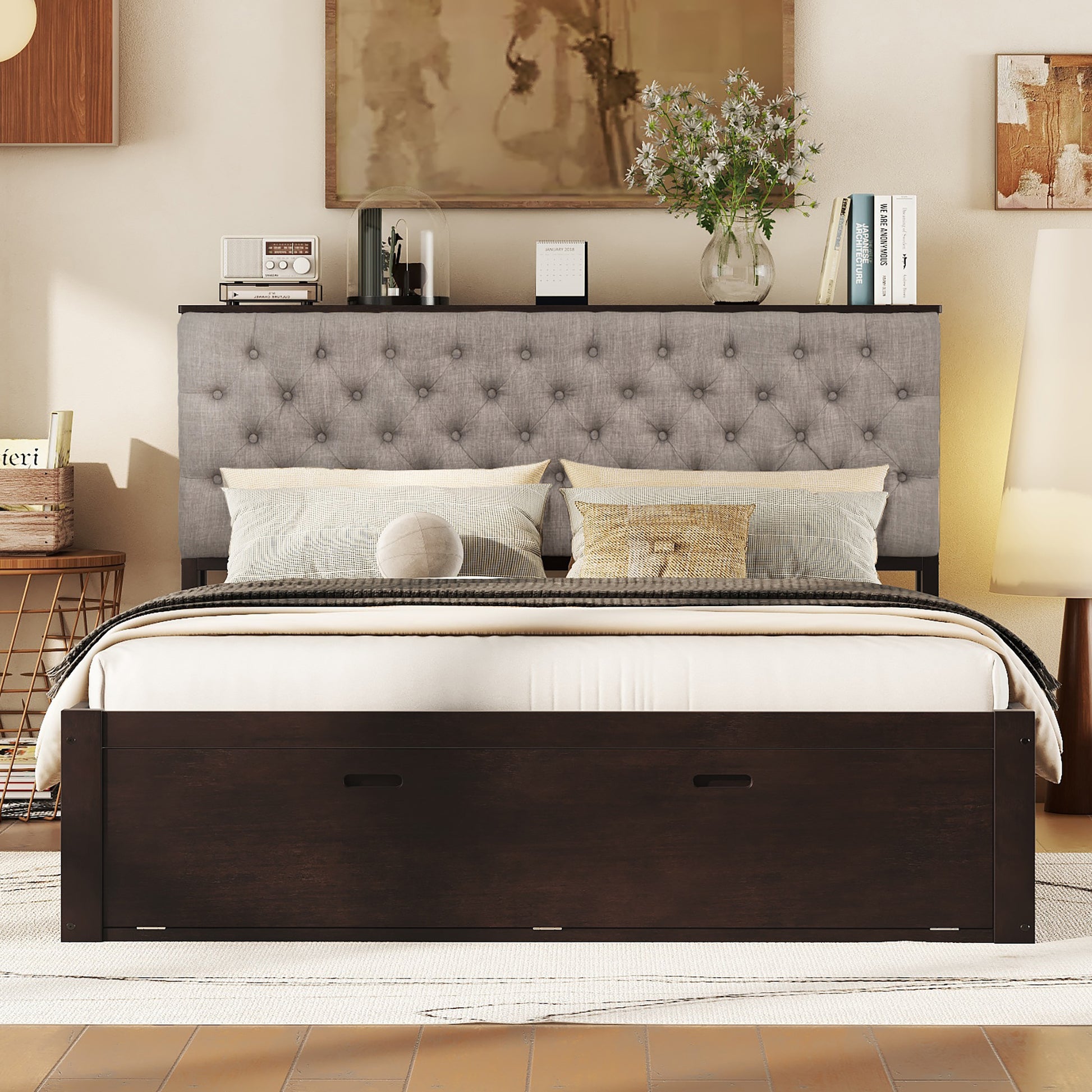Dark wood platform bed frame with tufted gray headboard and builtin drawers