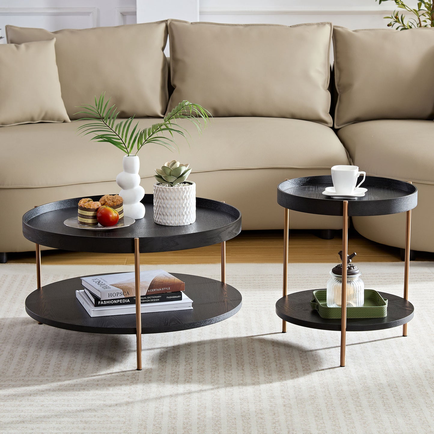 Twotiered black wood nesting coffee tables with copper legs