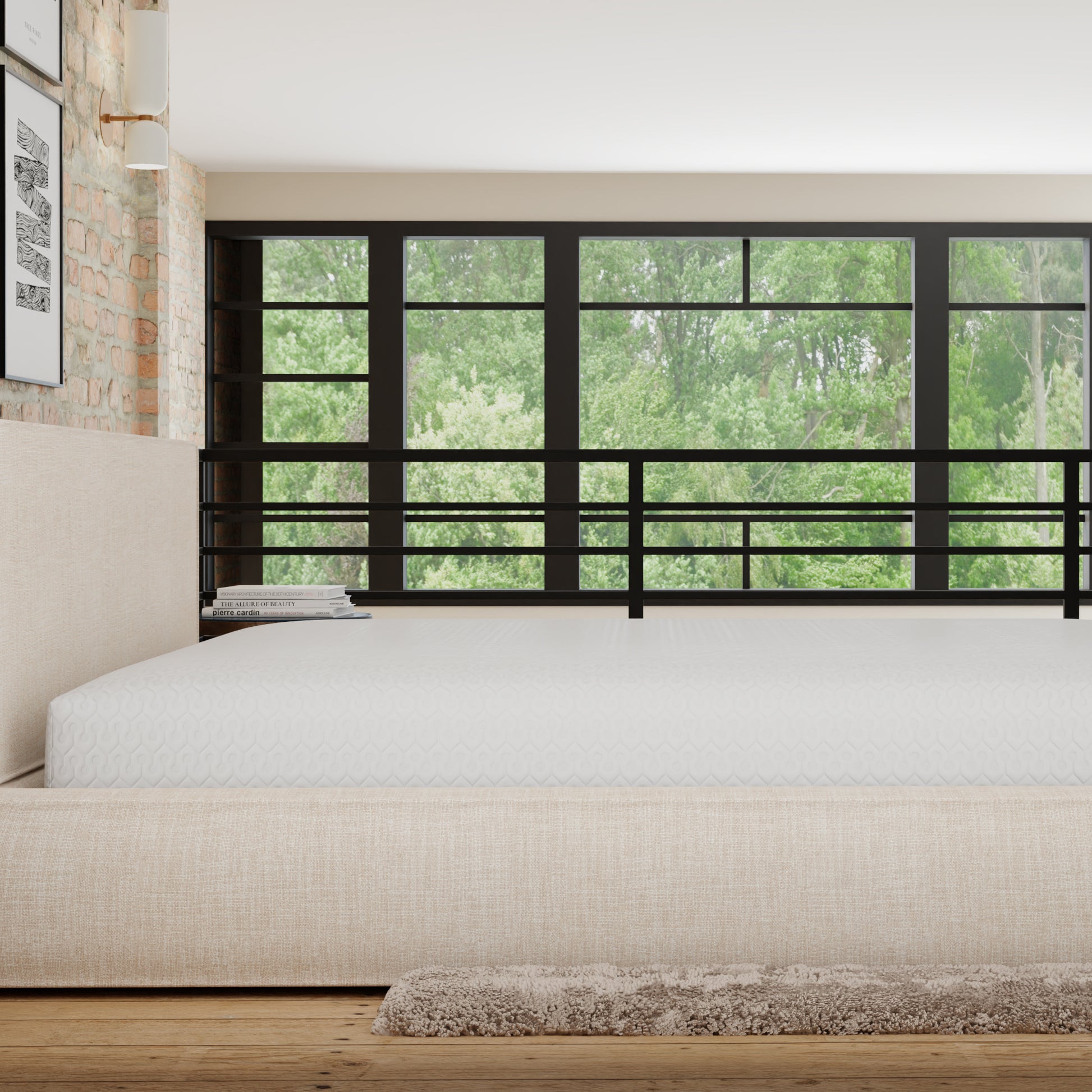 Beige upholstered bed frame with a white tufted mattress and a plush rug