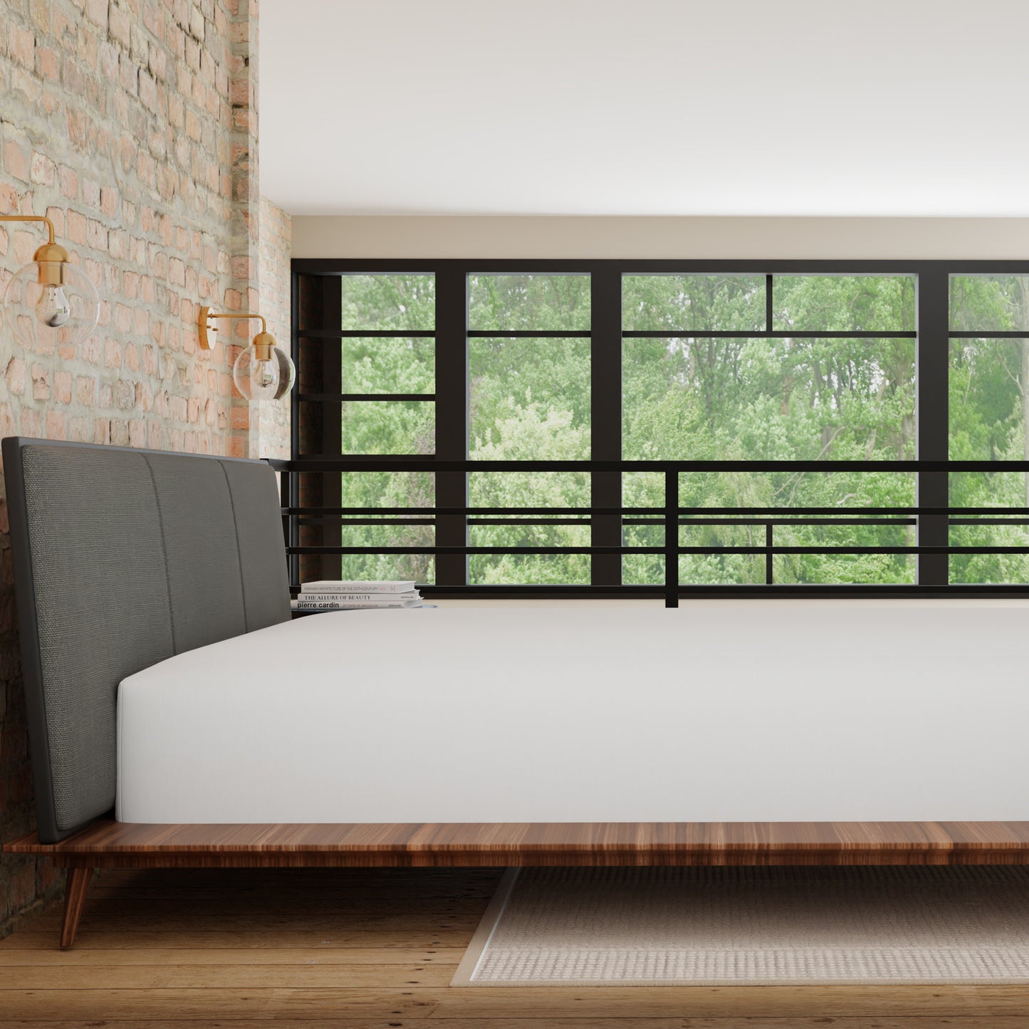 Modern upholstered grey headboard on a walnut wood bed frame
