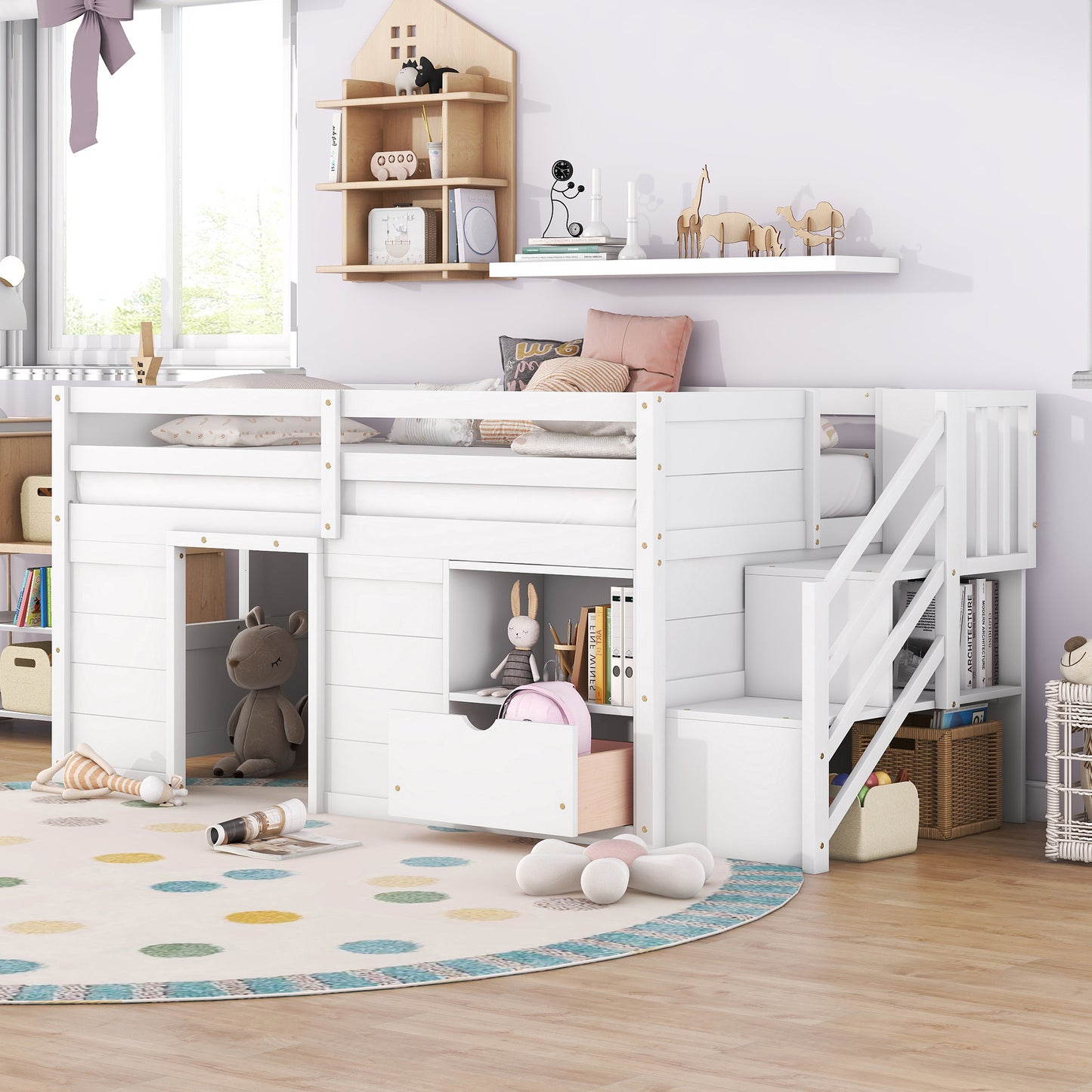 White wooden loft bed with stairs and playhouse features