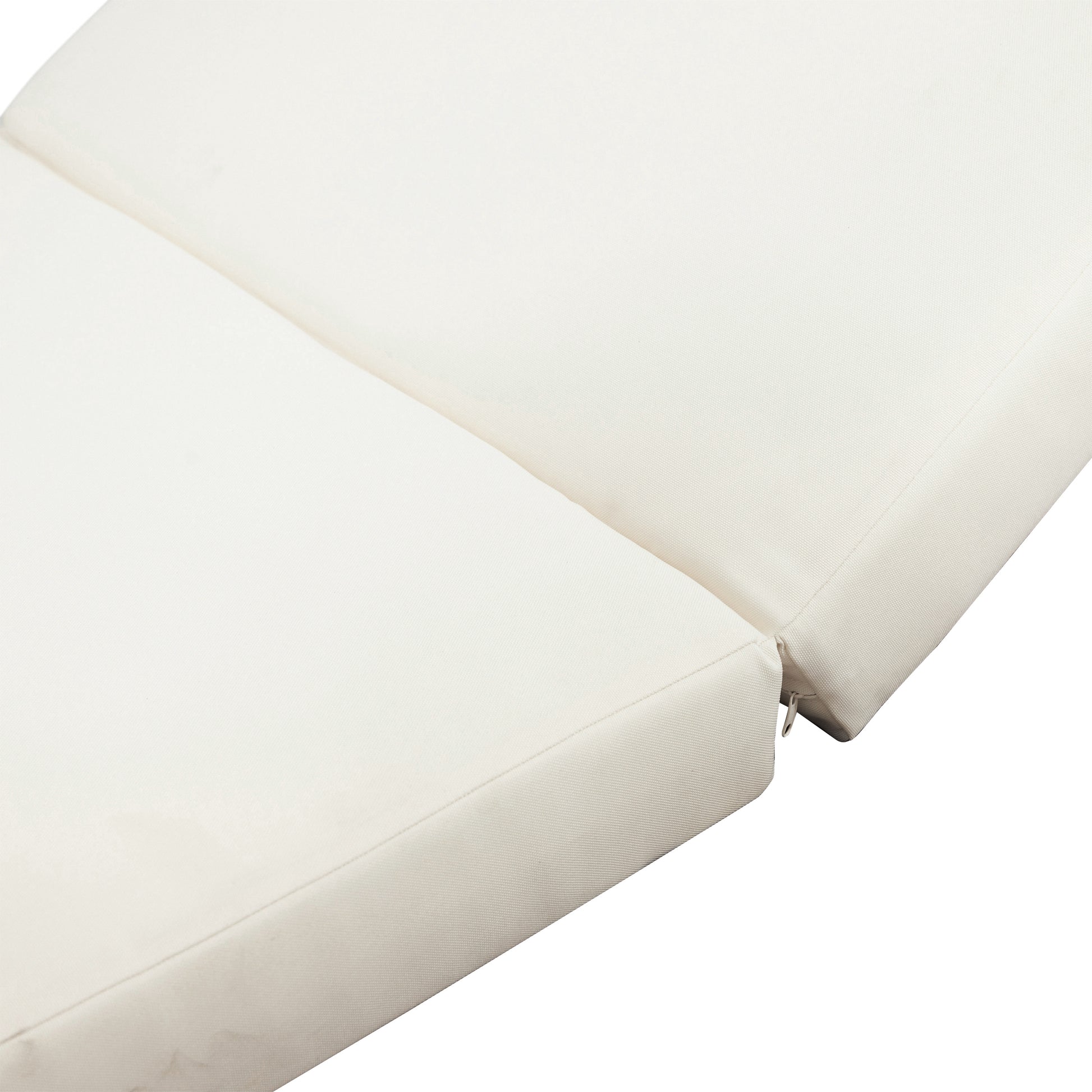 Closeup of a cream outdoor cushion showing textured fabric and zipper detail