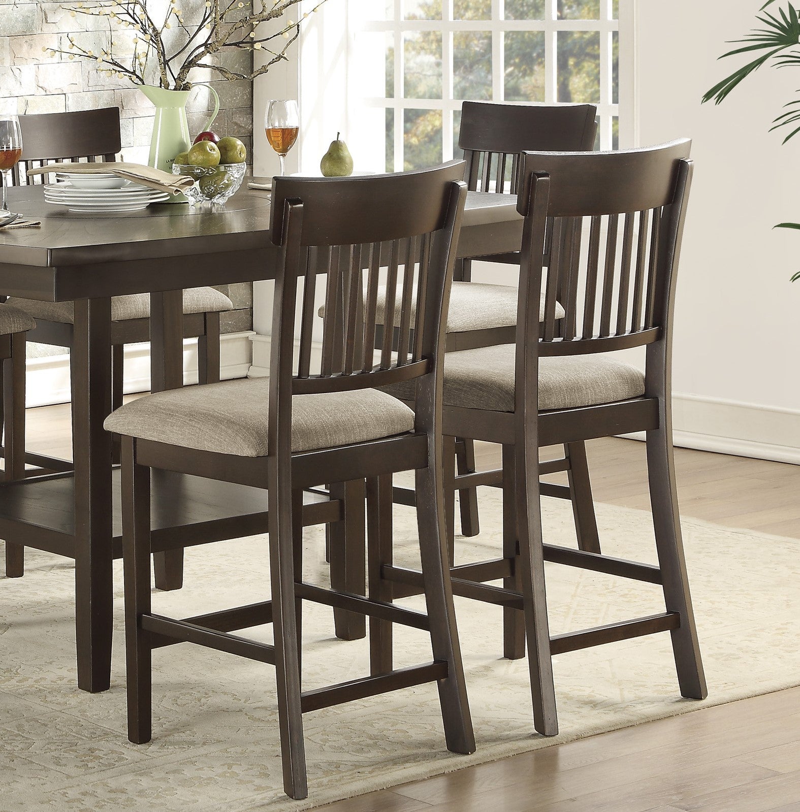 Dark wood dining chairs with upholstered seats