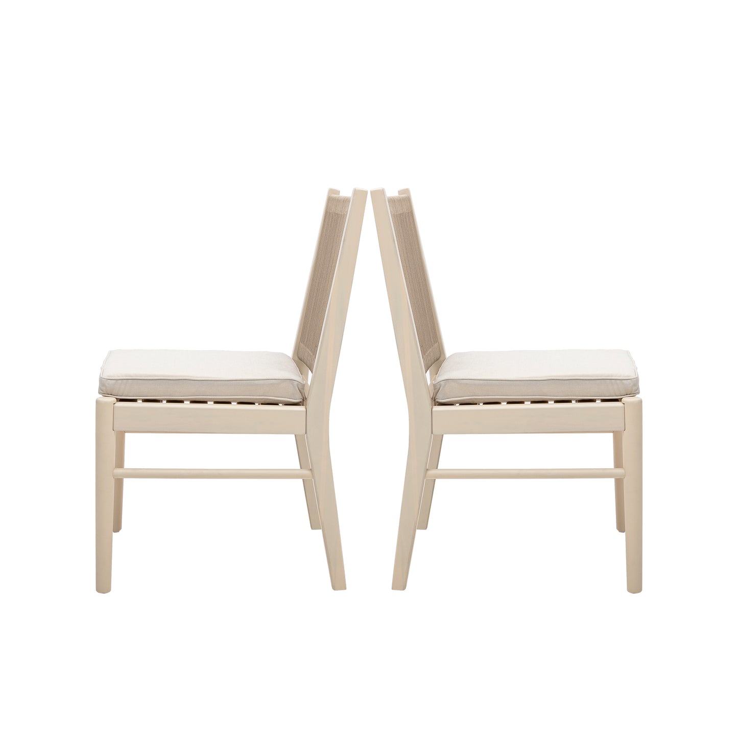 Two beige dining chairs with upholstered seats and woven backs