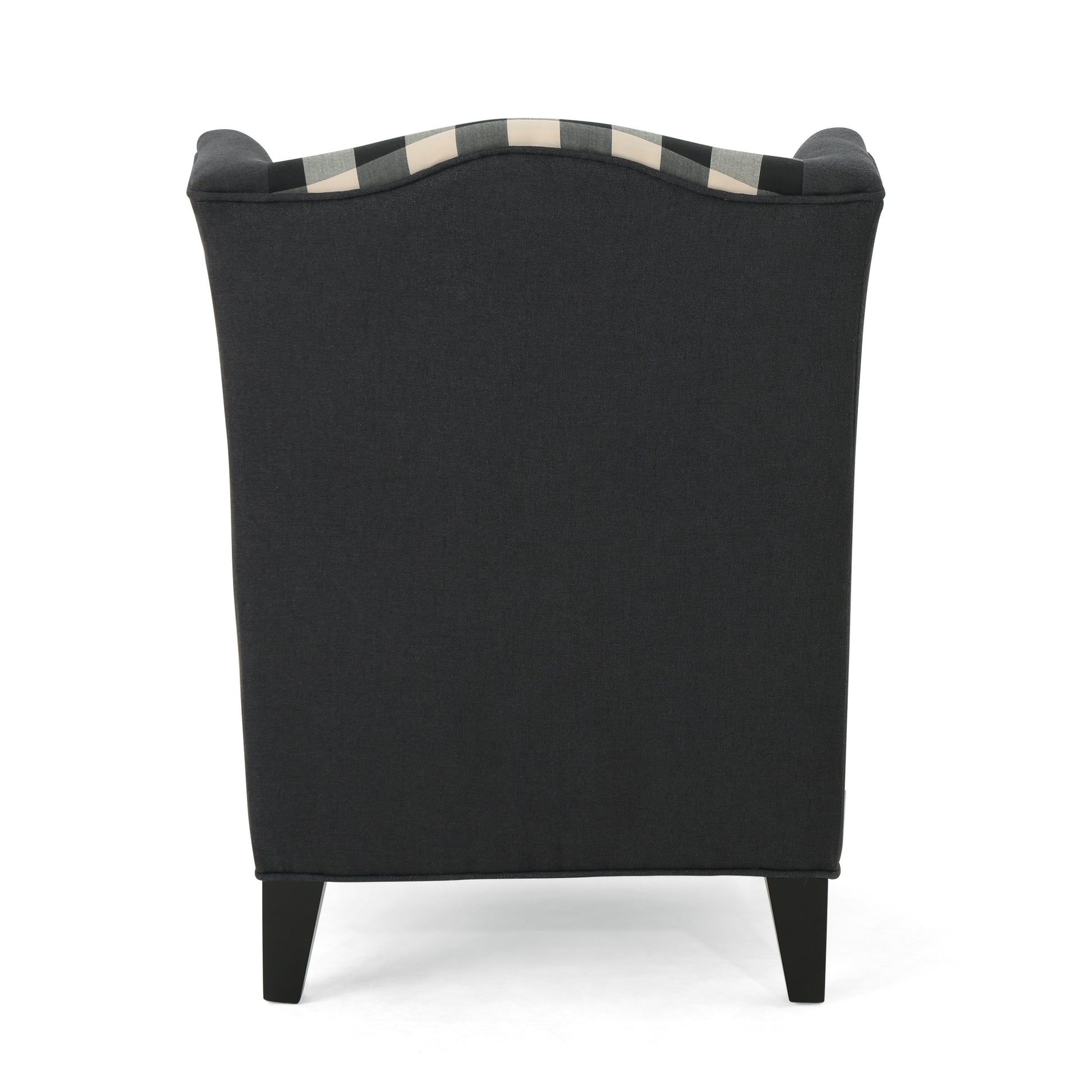 Dark grey upholstered wingback accent chair with black and white buffalo plaid top trim