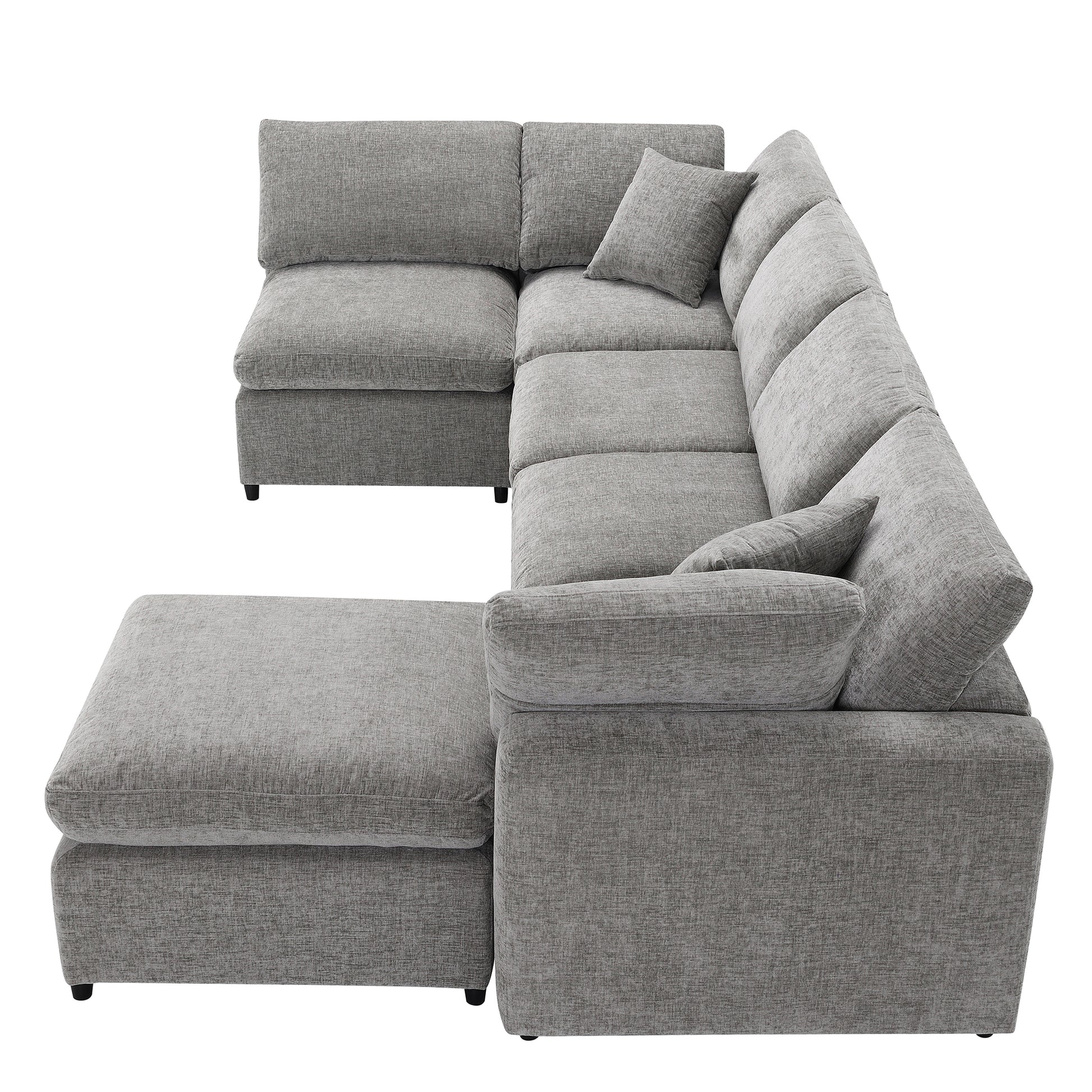 Spacious Lshaped sectional sofa in light grey textured fabric with multiple plush cushions