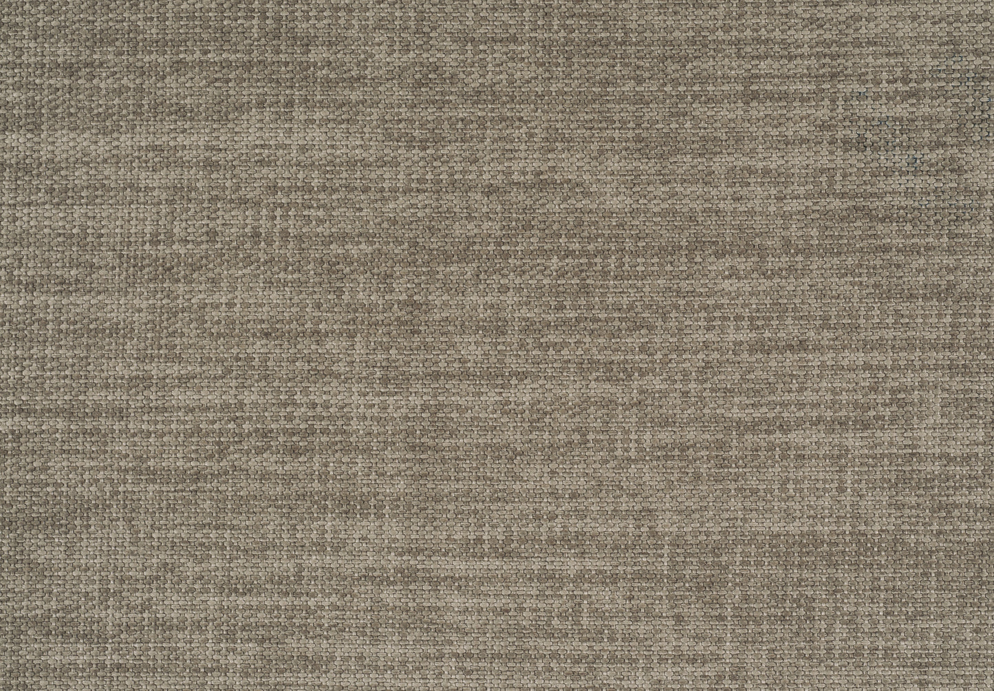 Closeup of textured neutral grey upholstery fabric with subtle weave detail