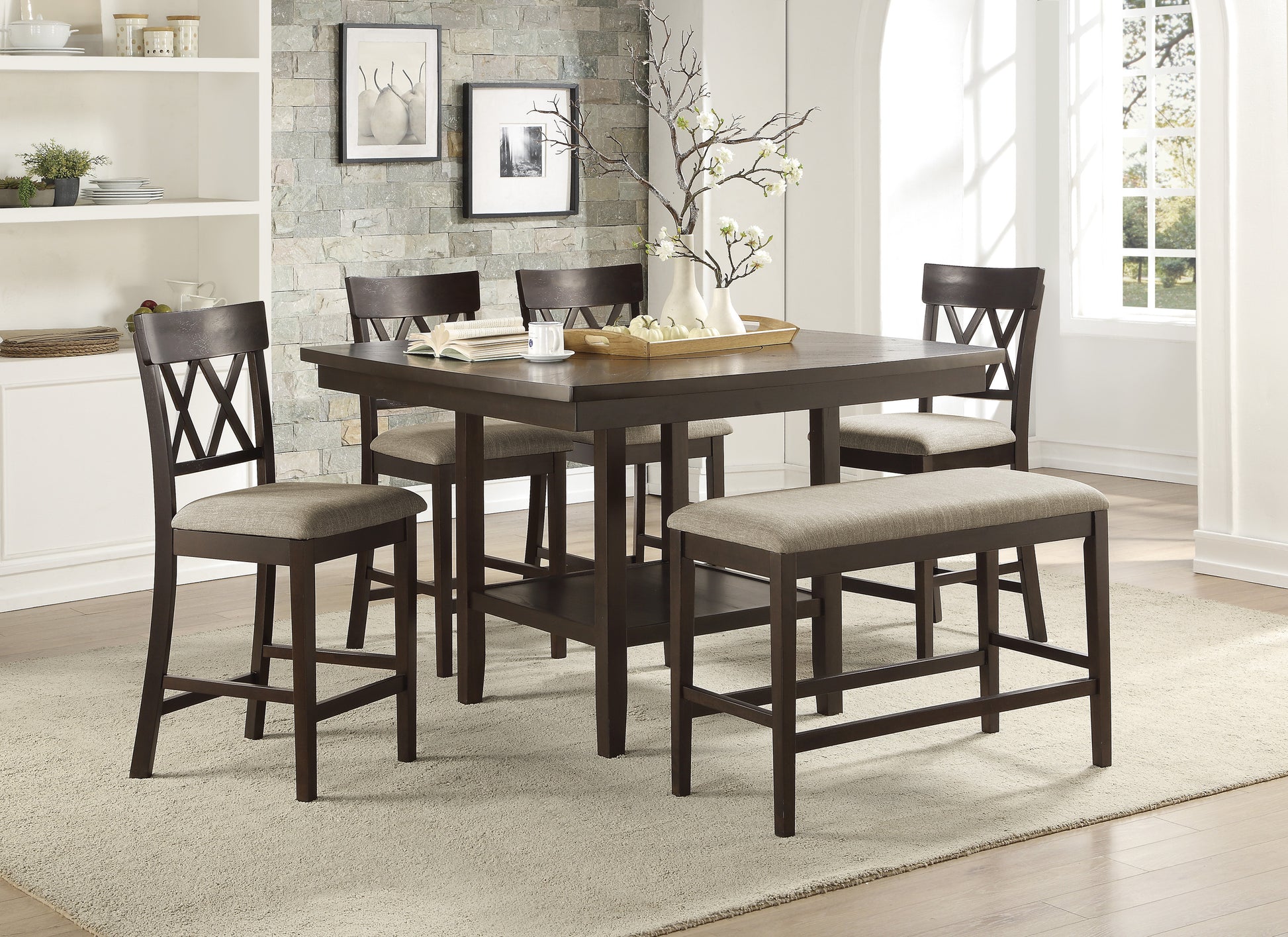Dark brown wood counter height table with upholstered stools and bench