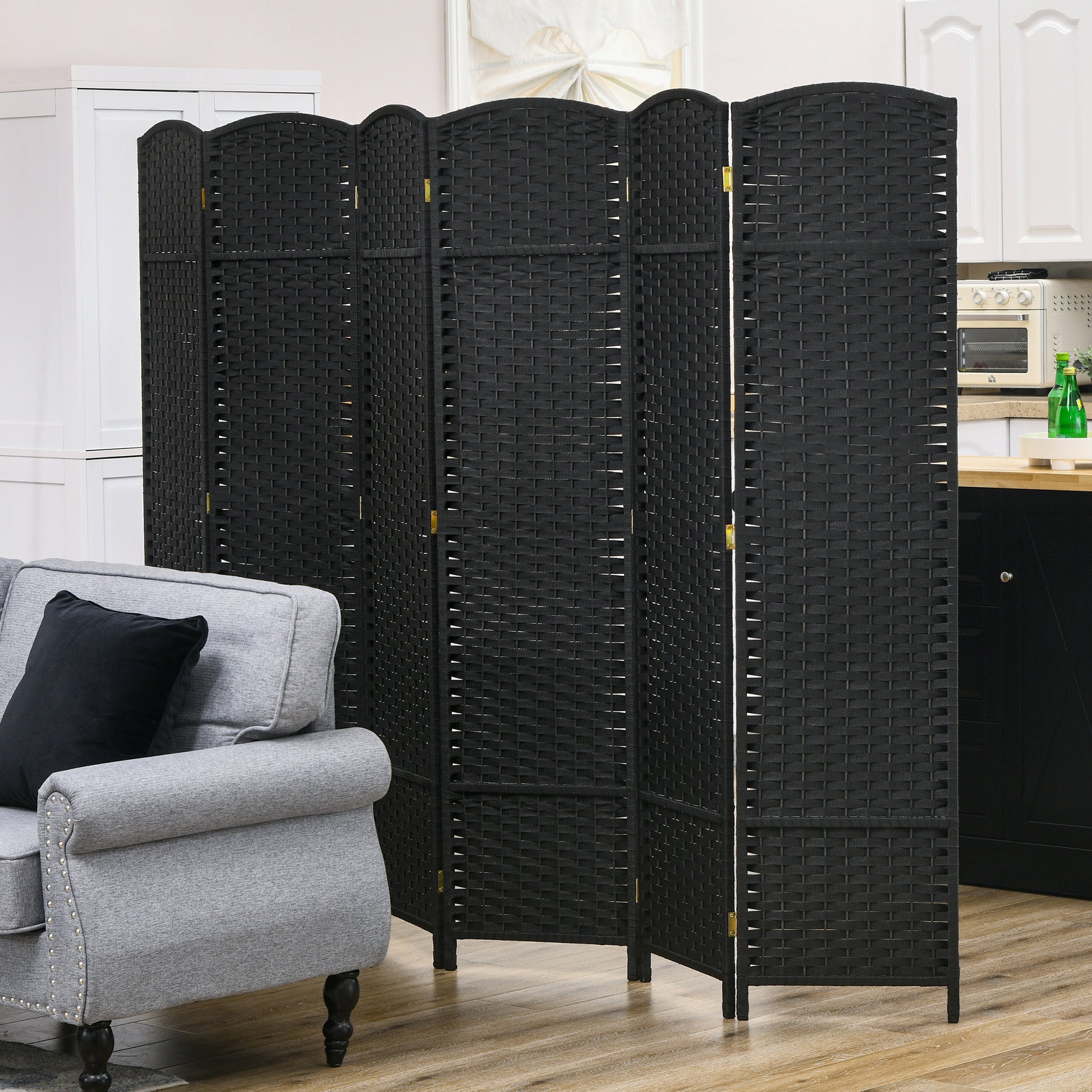 Black rattan folding screen divider with woven texture for room separation