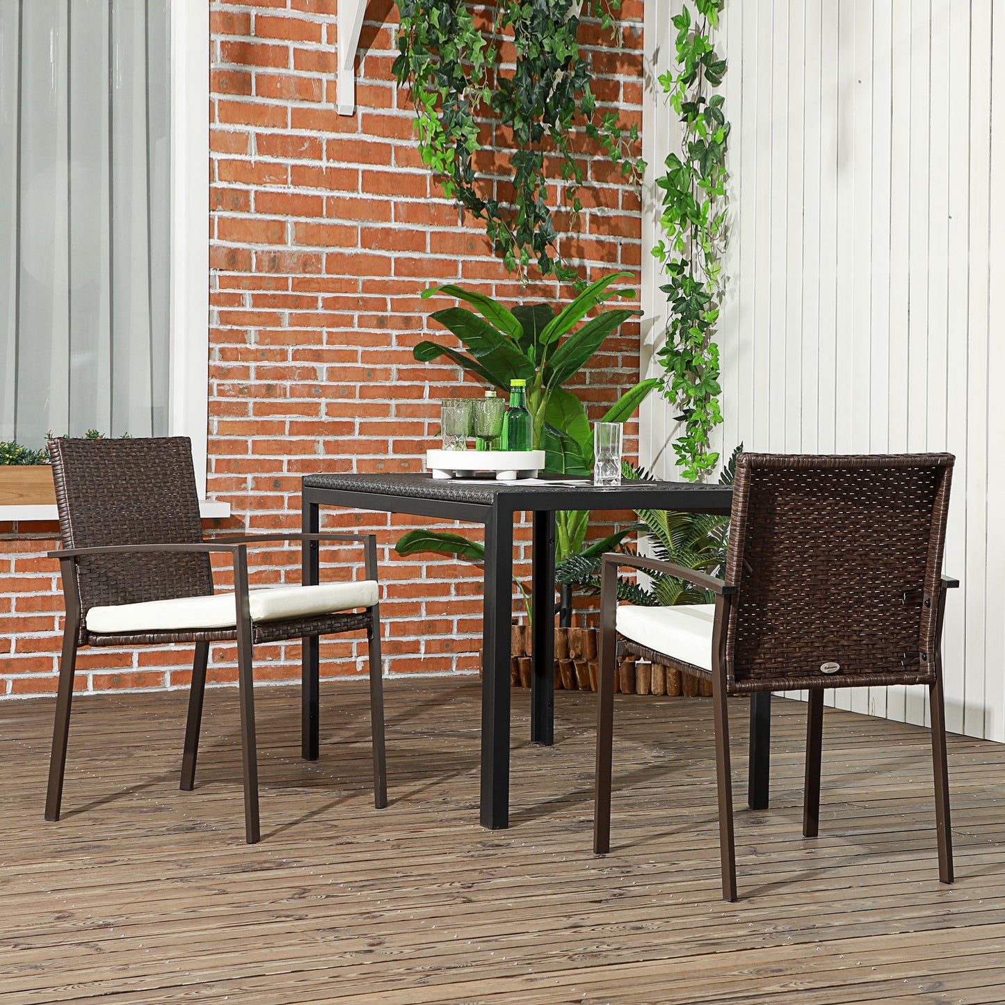 Brown wicker outdoor dining chair with cream cushion on a wooden deck