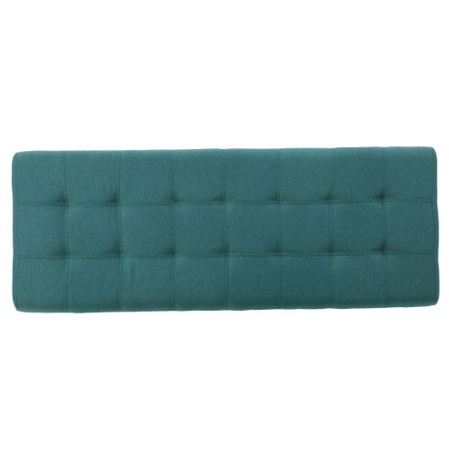 Teal upholstered tufted headboard with a modern design perfect for queen beds