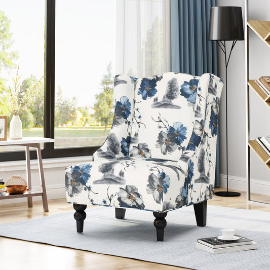 Floral wingback chair with blue and gray floral print on white fabric