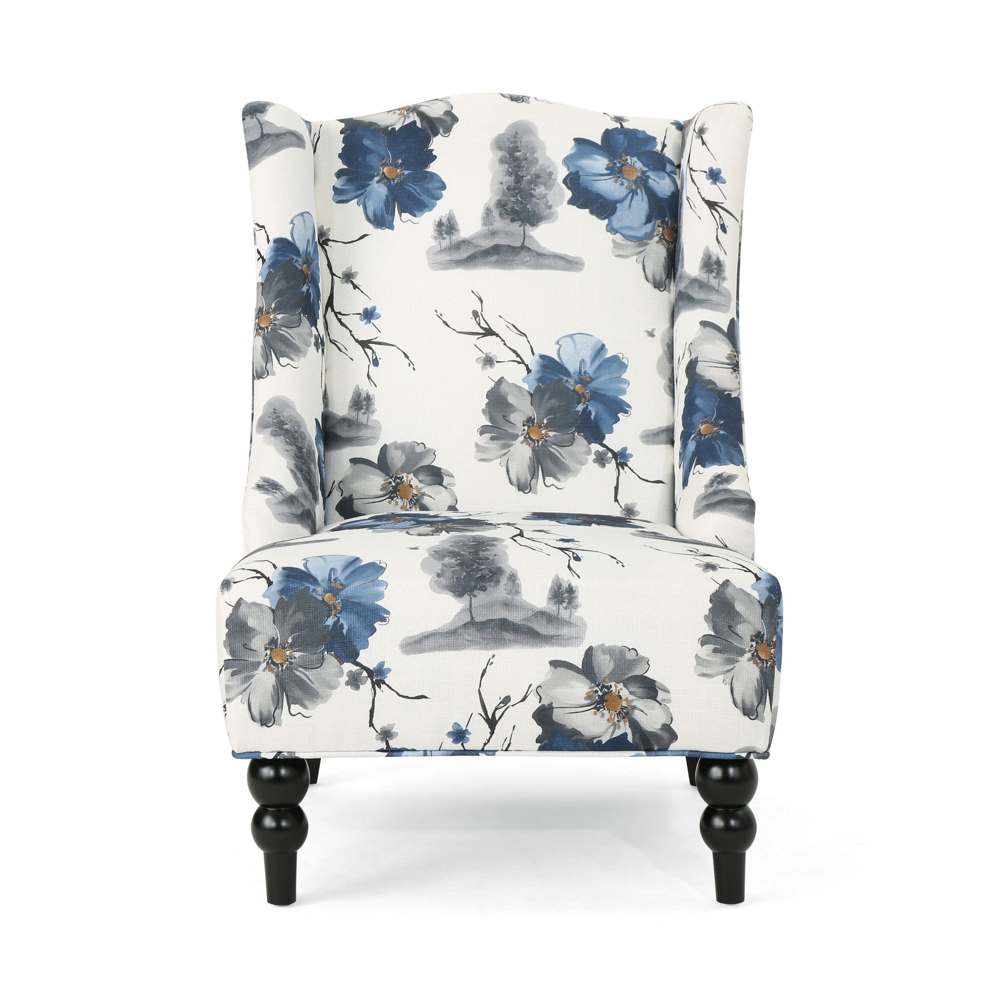 Wingback accent chair with a white fabric featuring a blue floral and tree watercolor print